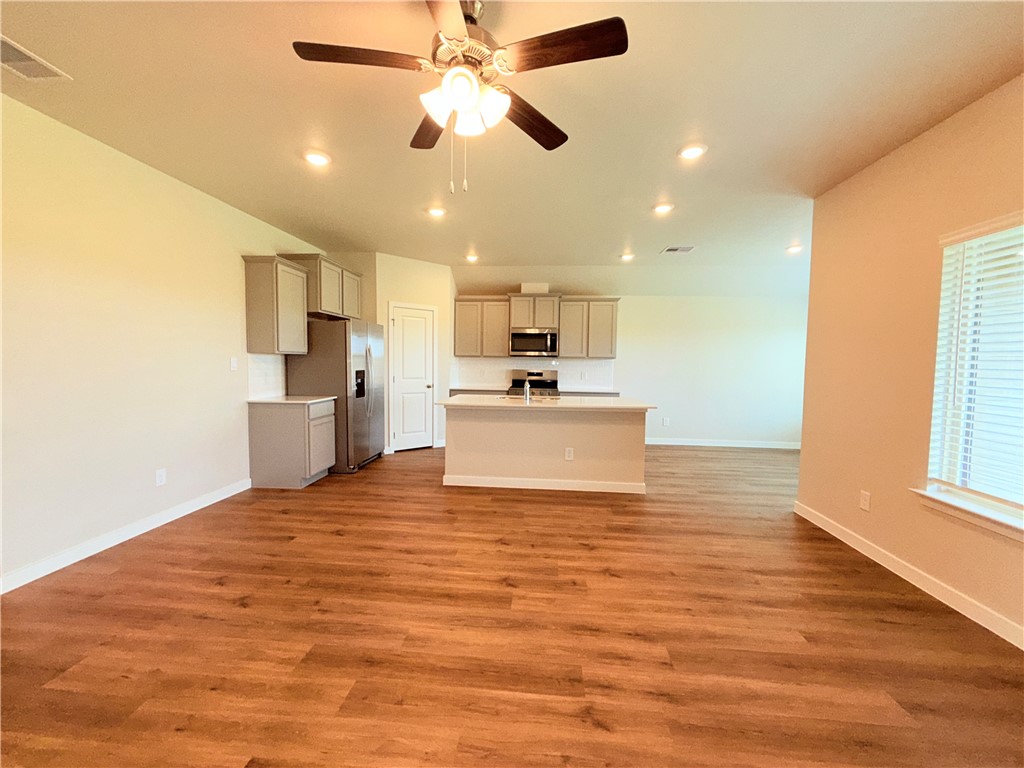 1116 Zeus Portland, TX 78374 - Photo 5 of 39 a view of a kitchen with a sink and microwave