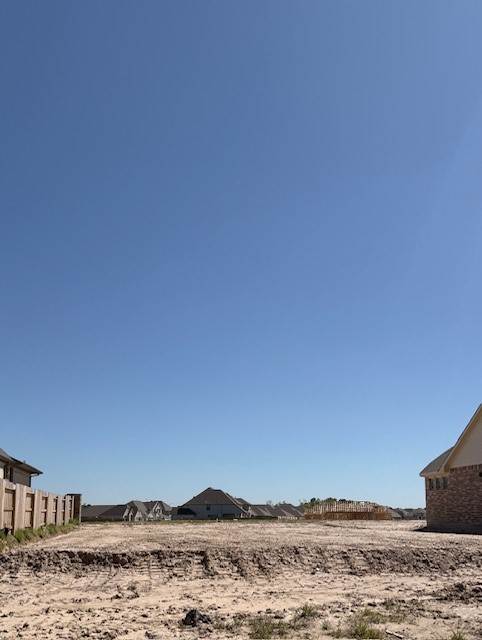 3352 Bentwood Ranch Drive Conroe, TX 77385 - Photo 6 of 13 a view of ocean with a mountain in the background
