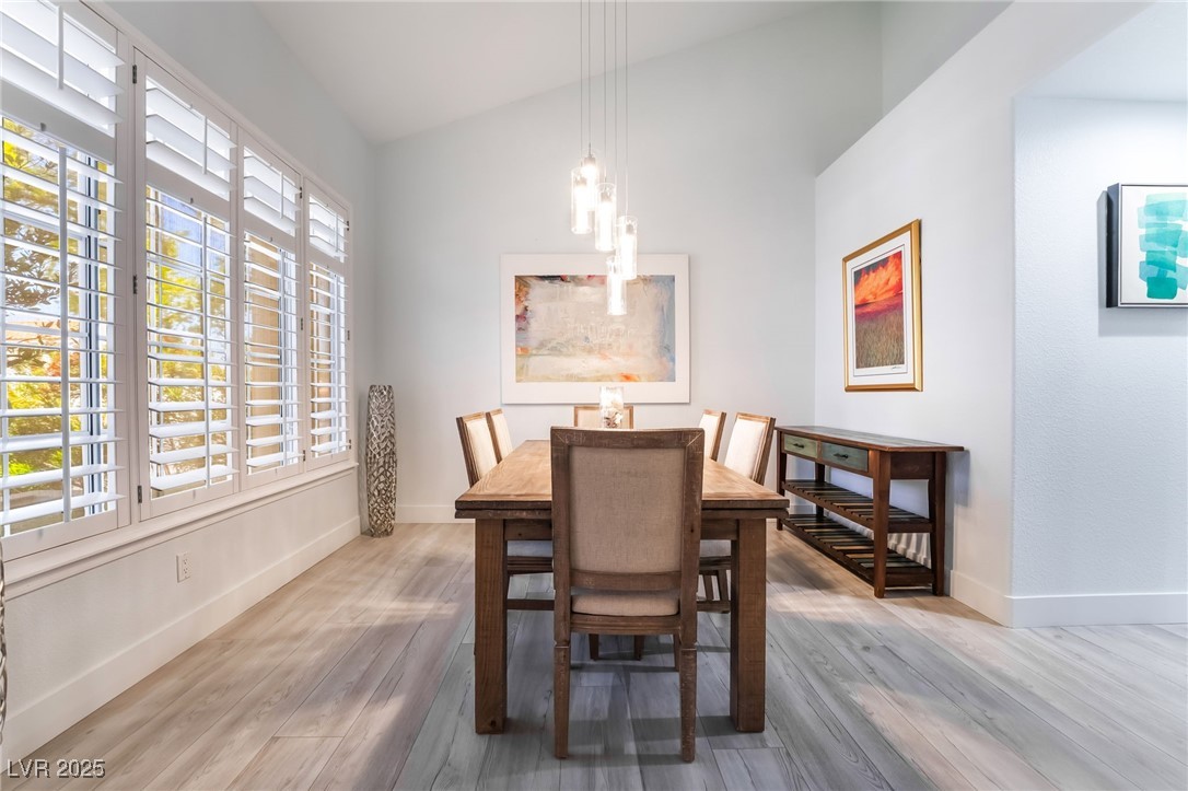 188 Carthage Street Henderson, NV 89074 - Photo 13 of 56 Dining area featuring wood finished floors, basebo