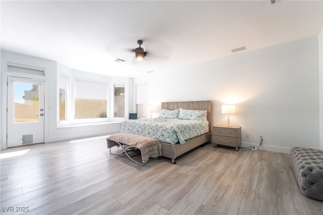 188 Carthage Street Henderson, NV 89074 - Photo 27 of 56 Bedroom with light wood-type flooring, baseboards,