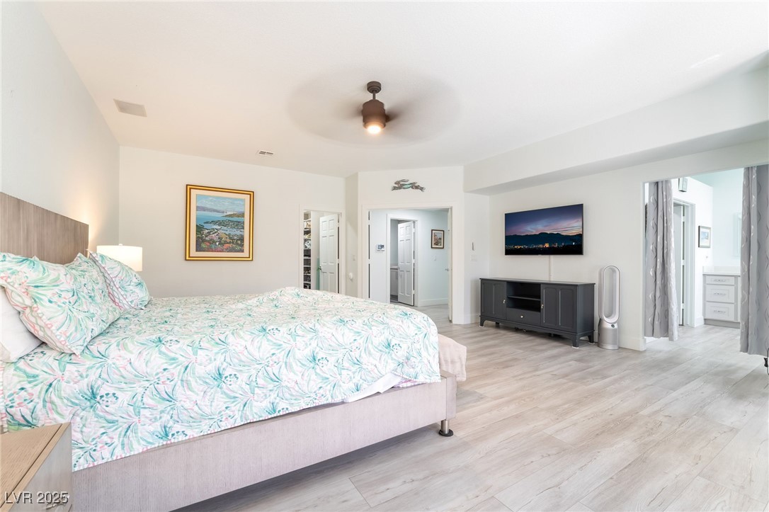 188 Carthage Street Henderson, NV 89074 - Photo 29 of 56 Bedroom featuring light wood-type flooring, ensuit
