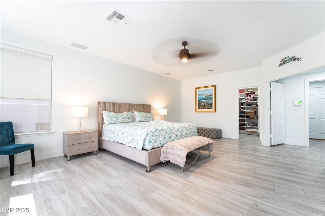 188 Carthage Street Henderson, NV 89074 - Photo 30 of 56 Bedroom with light wood-style flooring, baseboards
