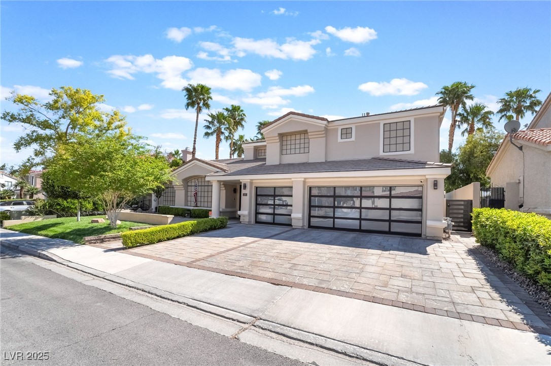188 Carthage Street Henderson, NV 89074 - Photo 3 of 56 View of front of property featuring a garage, deco