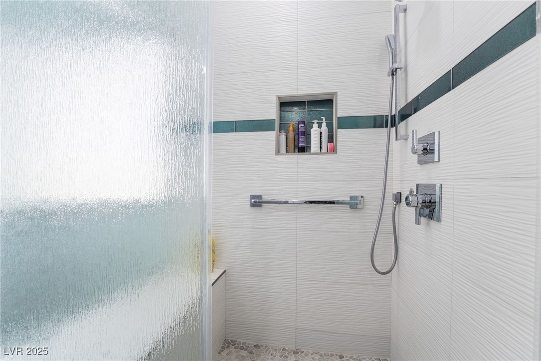 188 Carthage Street Henderson, NV 89074 - Photo 32 of 56 Full bathroom featuring tiled shower