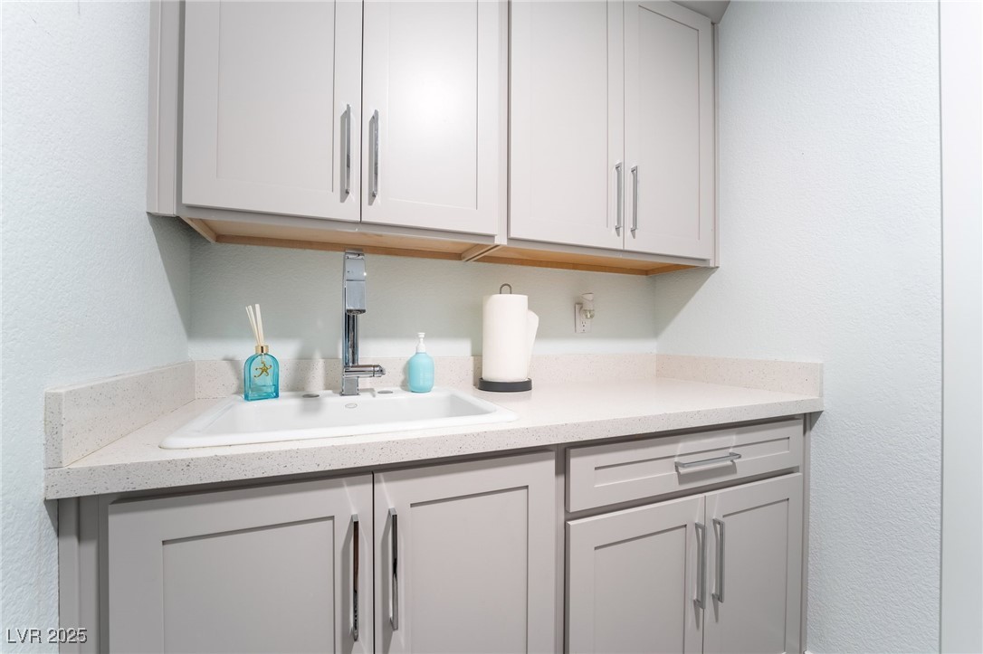 188 Carthage Street Henderson, NV 89074 - Photo 36 of 56 Bar featuring a sink