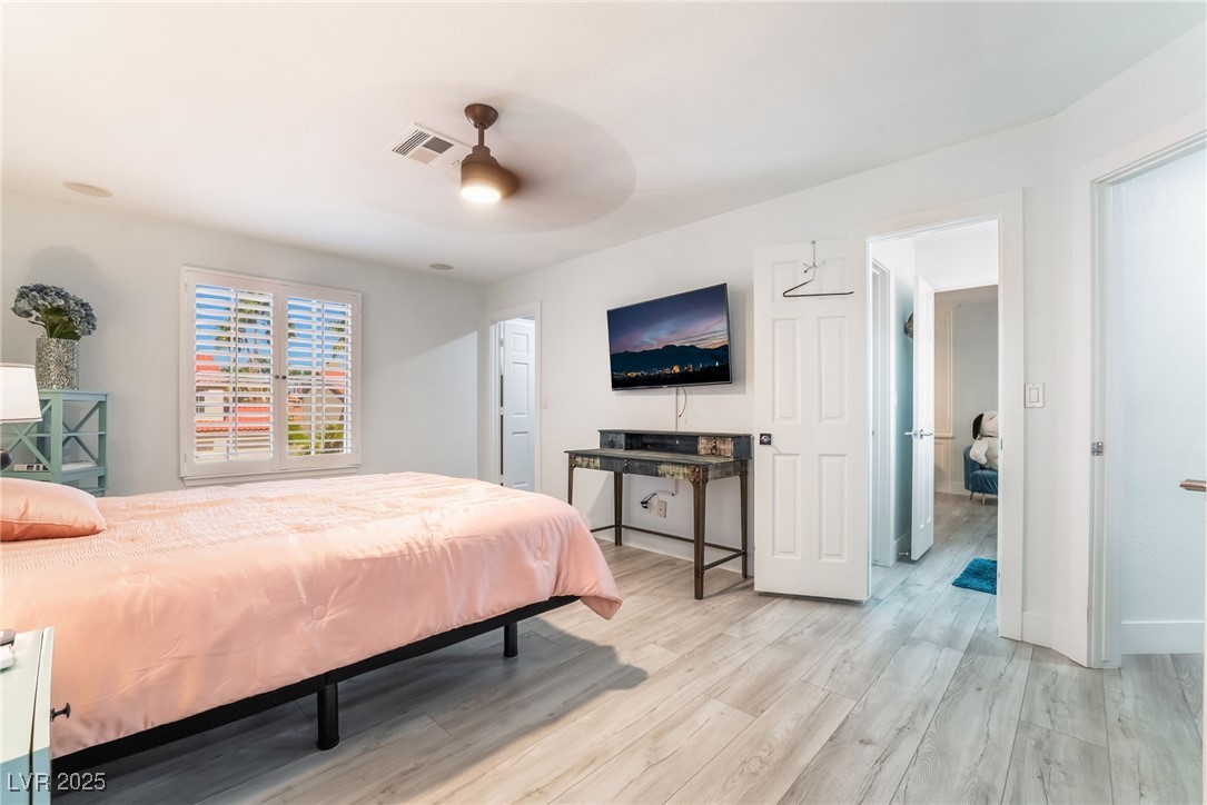188 Carthage Street Henderson, NV 89074 - Photo 44 of 56 Bedroom featuring light wood-type flooring and a c