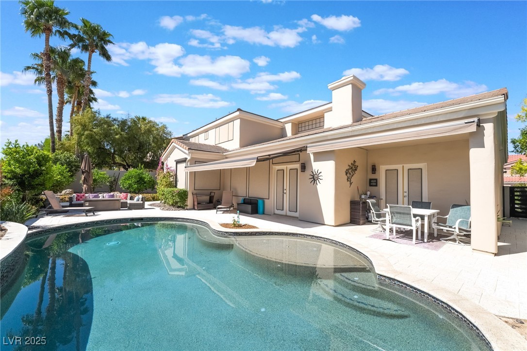 188 Carthage Street Henderson, NV 89074 - Photo 54 of 56 Rear view of house with stucco siding, a patio, fr