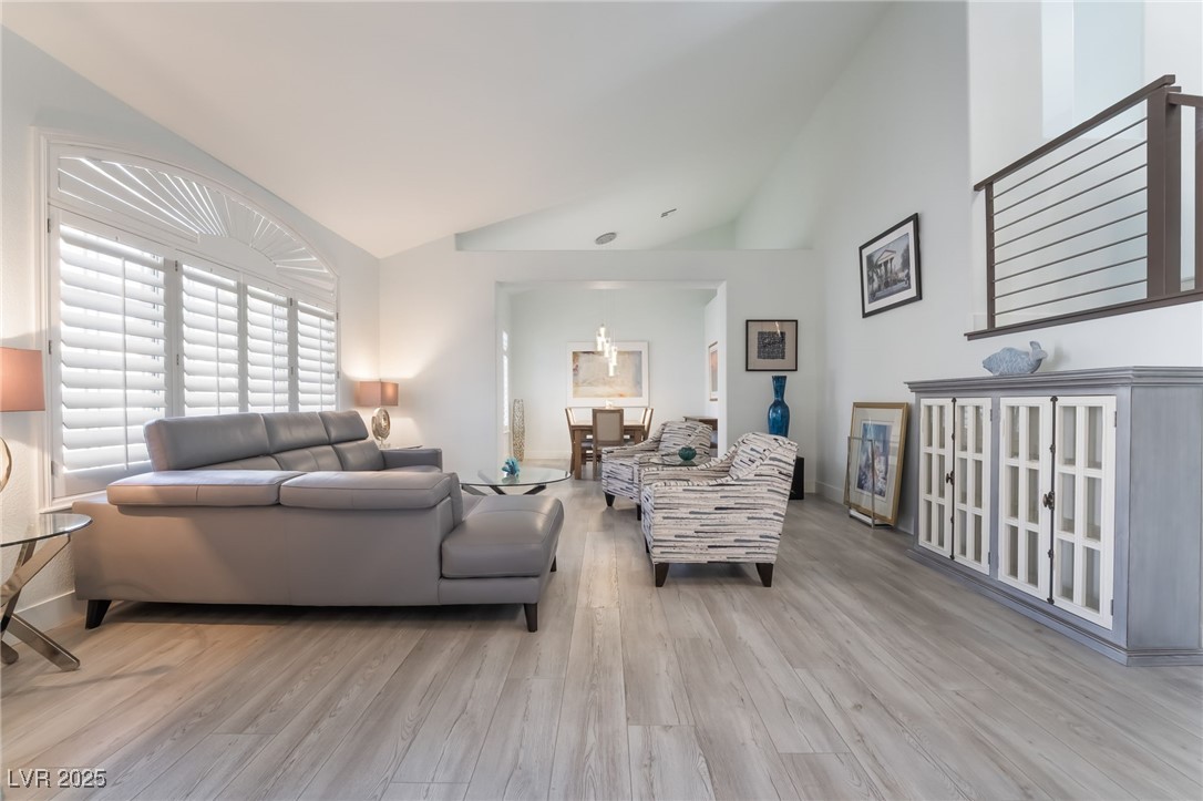 188 Carthage Street Henderson, NV 89074 - Photo 9 of 56 Living area featuring wood finished floors and hig