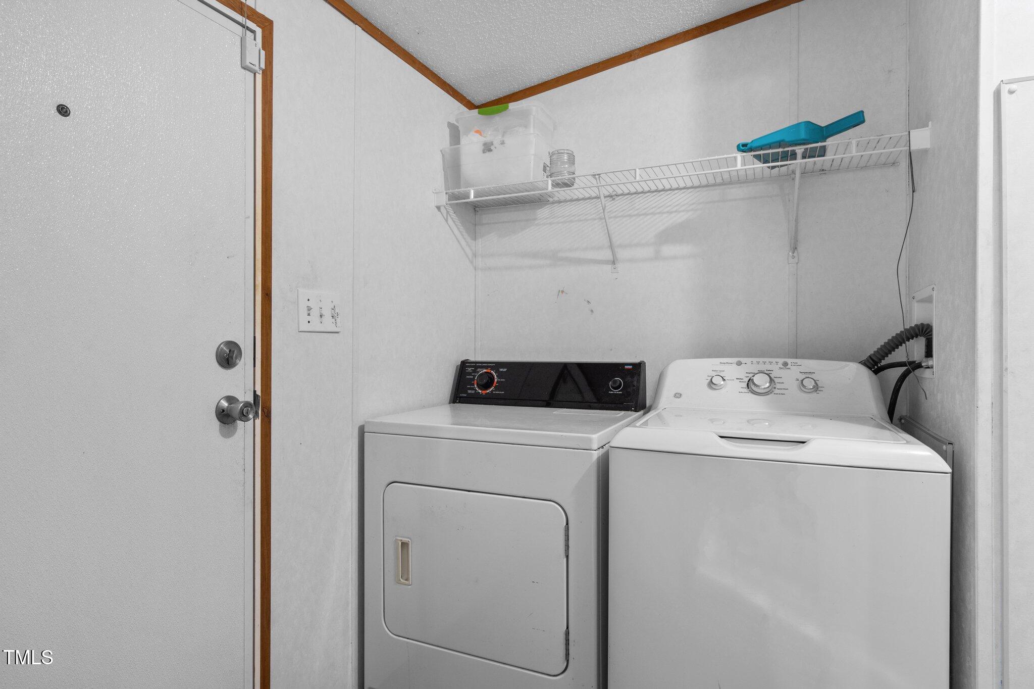149 Michael Jones Road Roxboro, NC 27574 - Photo 9 of 32 a utility room with dryer and washer
