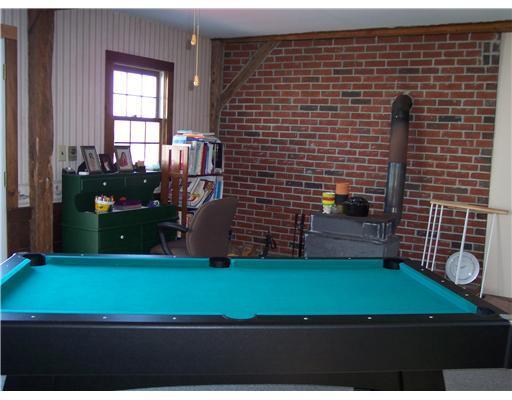 30 Brackett Road Gorham, ME 04038 - Photo 9 of 14 Den/Family/Great Room. Wood stove...