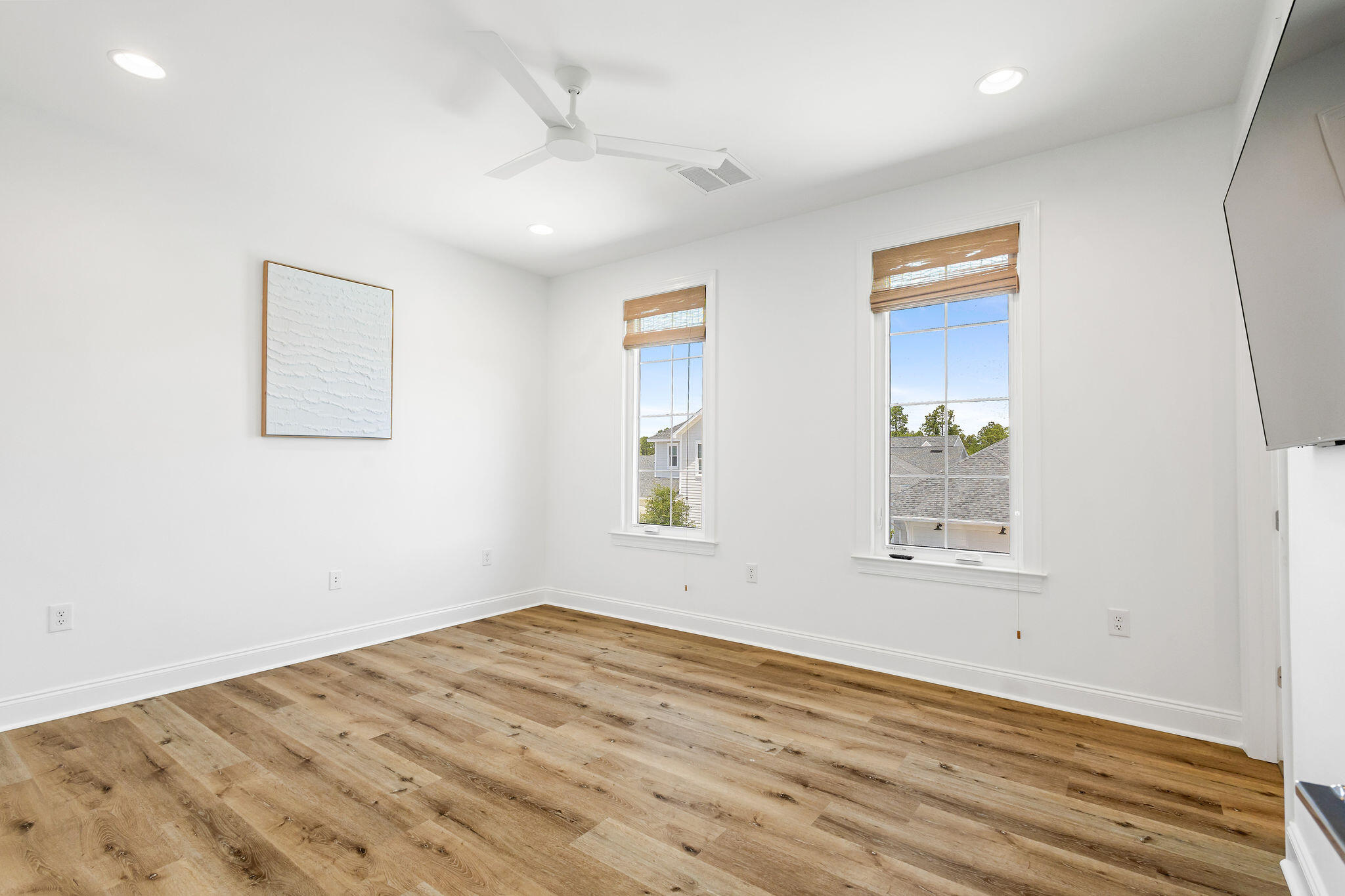 11 Bunting Ln Inlet Beach Inlet Beach, FL 32461 - Photo 37 of 70 a view of empty room with wooden floor and fan