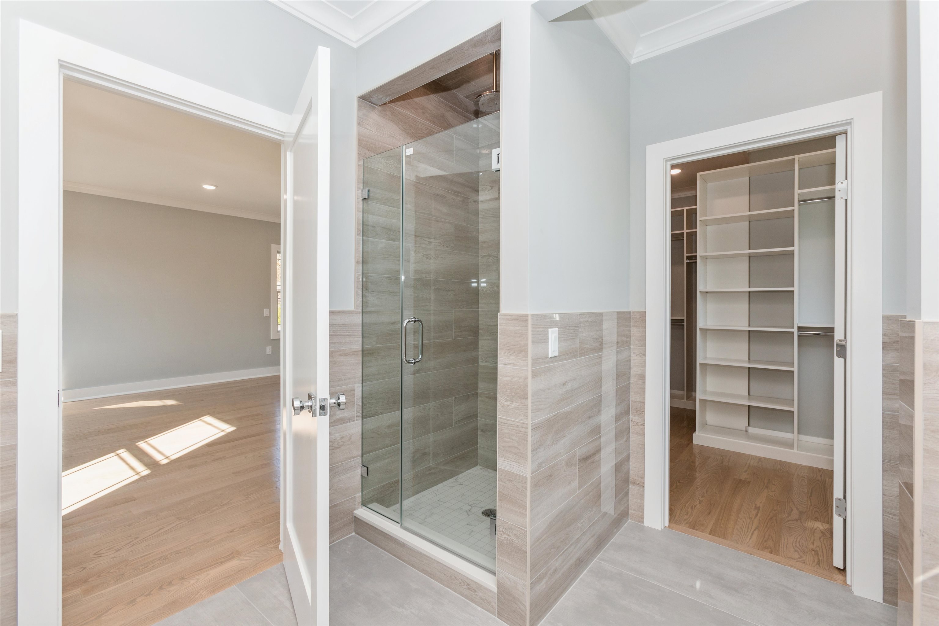 8 Gregory Road Springfield, NJ 07081 - Photo 12 of 30 a bathroom with a glass shower door