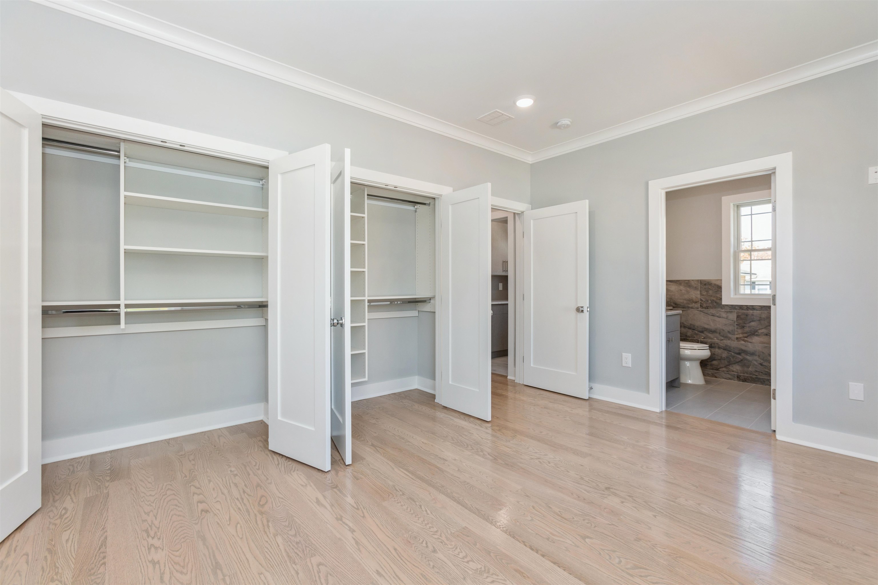 8 Gregory Road Springfield, NJ 07081 - Photo 18 of 30 a view of a room with a furniture and a hallway