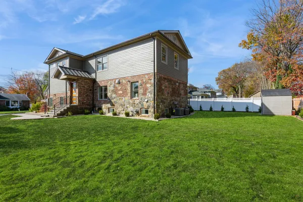 a front view of house with yard