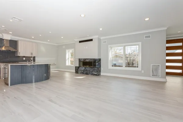 a view of kitchen with furniture and window