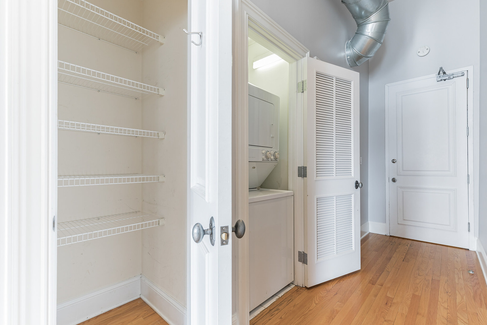 166 West Grand Avenue, Unit 3B Chicago, IL 60654 - Photo 15 of 16 a view of a bathroom with wooden floor