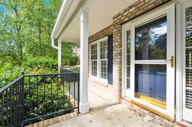 a view of a door and a window