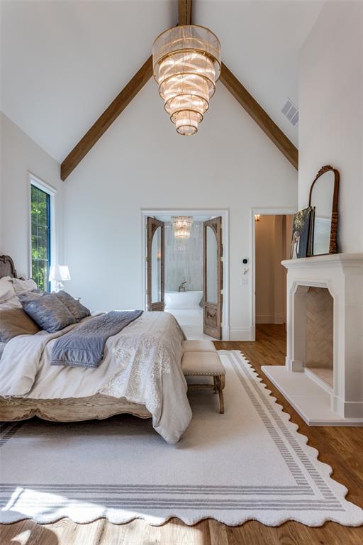 1133 Bourland Road Keller, TX 76248 - Photo 16 of 39 a bedroom with a bed and a large window