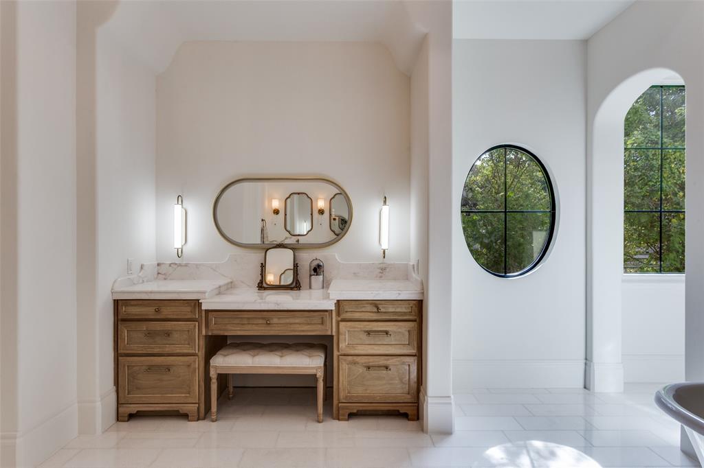 1133 Bourland Road Keller, TX 76248 - Photo 19 of 39 a room with a furniture a mirror and a window