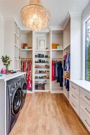 a view of a storage & utility room with washer and dryer