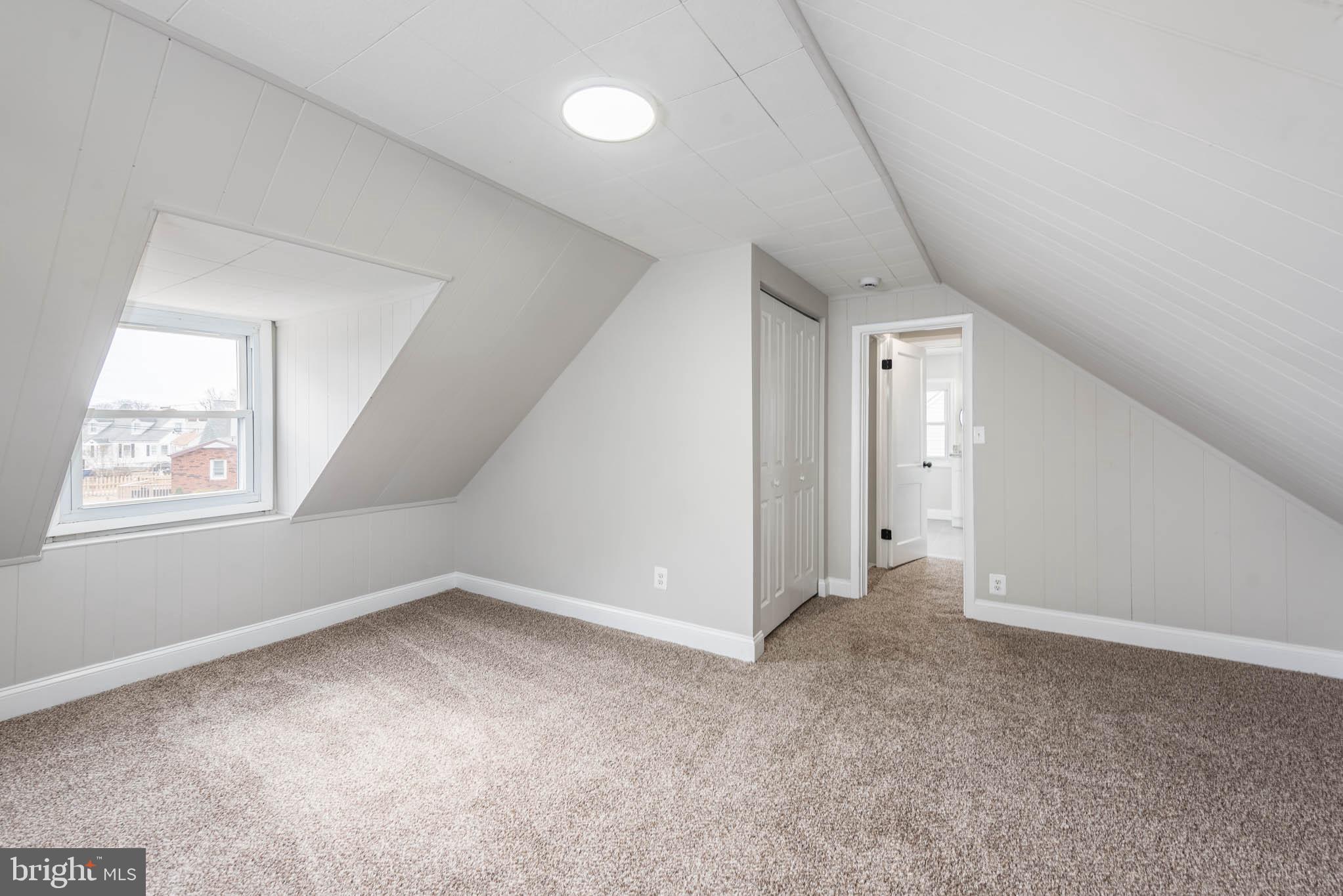 8106 Murray Point Road Dundalk, MD 21222 - Photo 15 of 32 a view of an empty room with a window