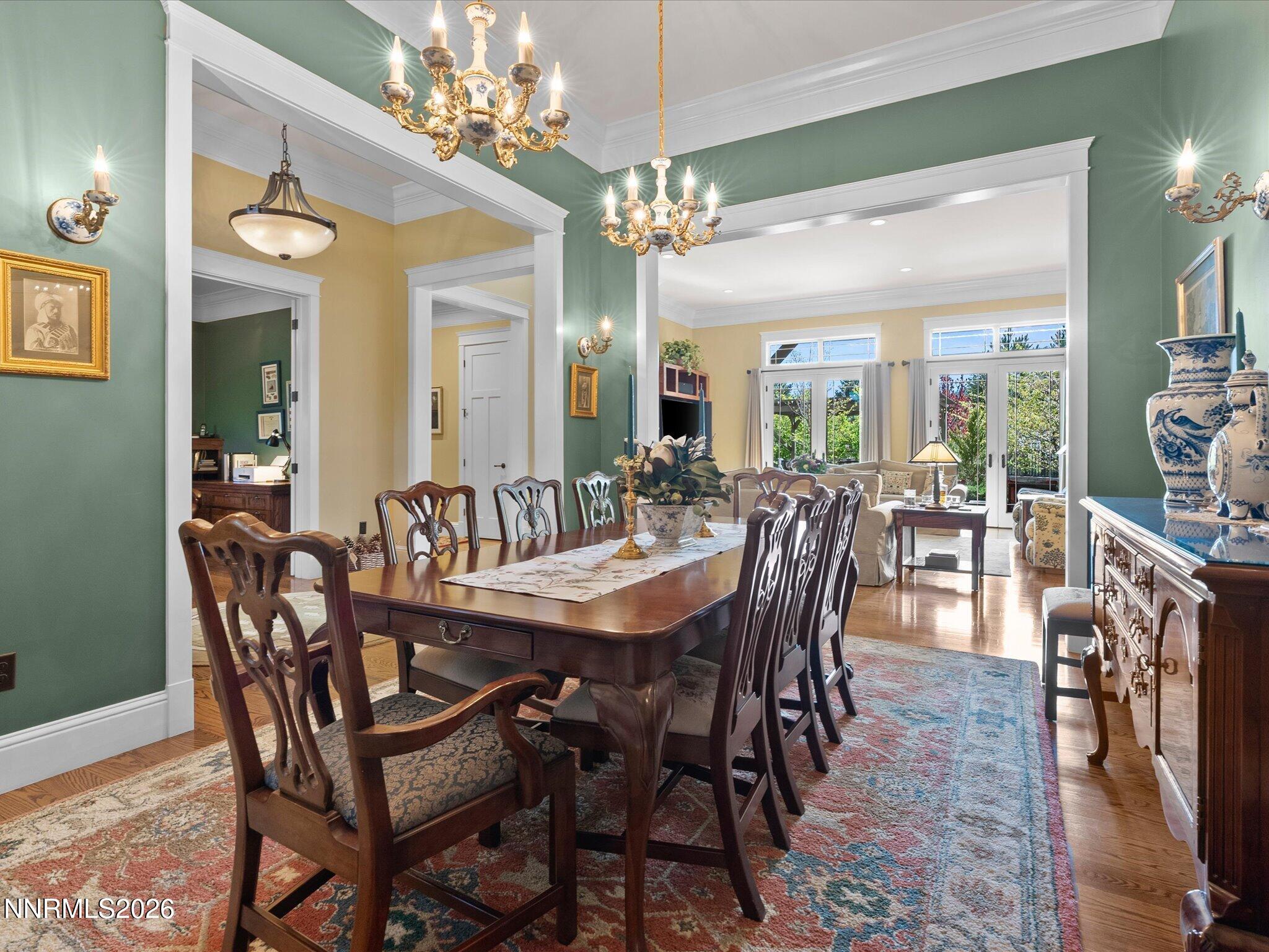 201 South Argyle Court Reno, NV 89511 - Photo 25 of 95 a view of a dining room with furniture and chandelier