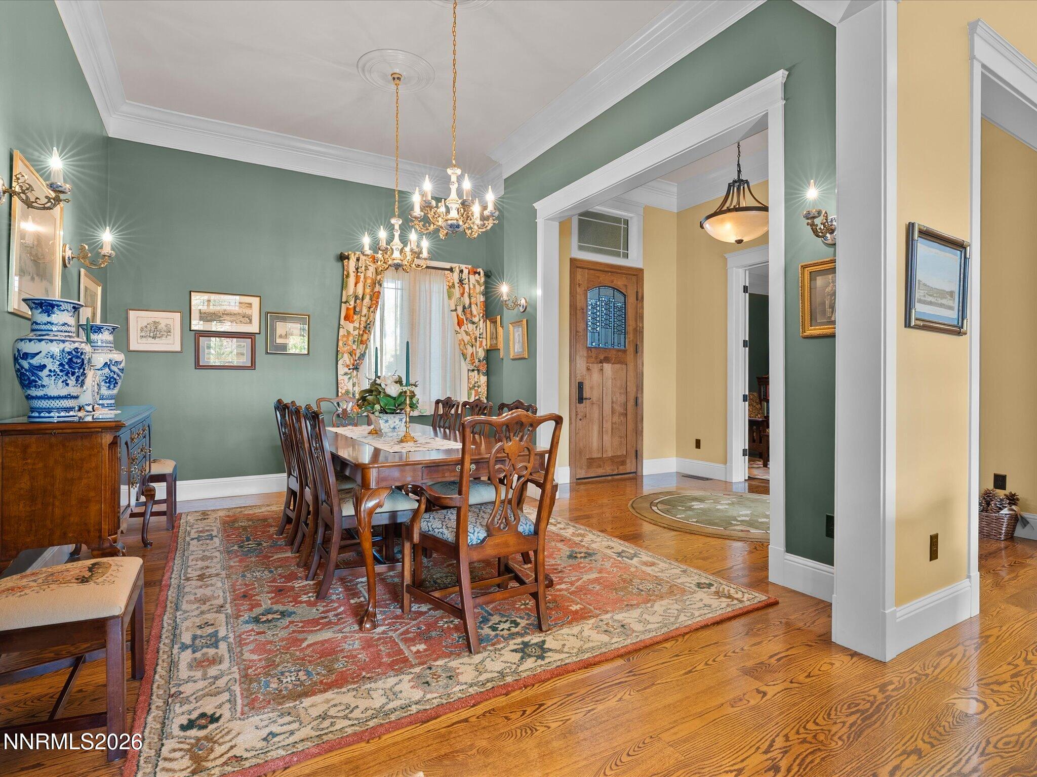201 South Argyle Court Reno, NV 89511 - Photo 27 of 95 a view of a dining room with furniture window and wooden floor