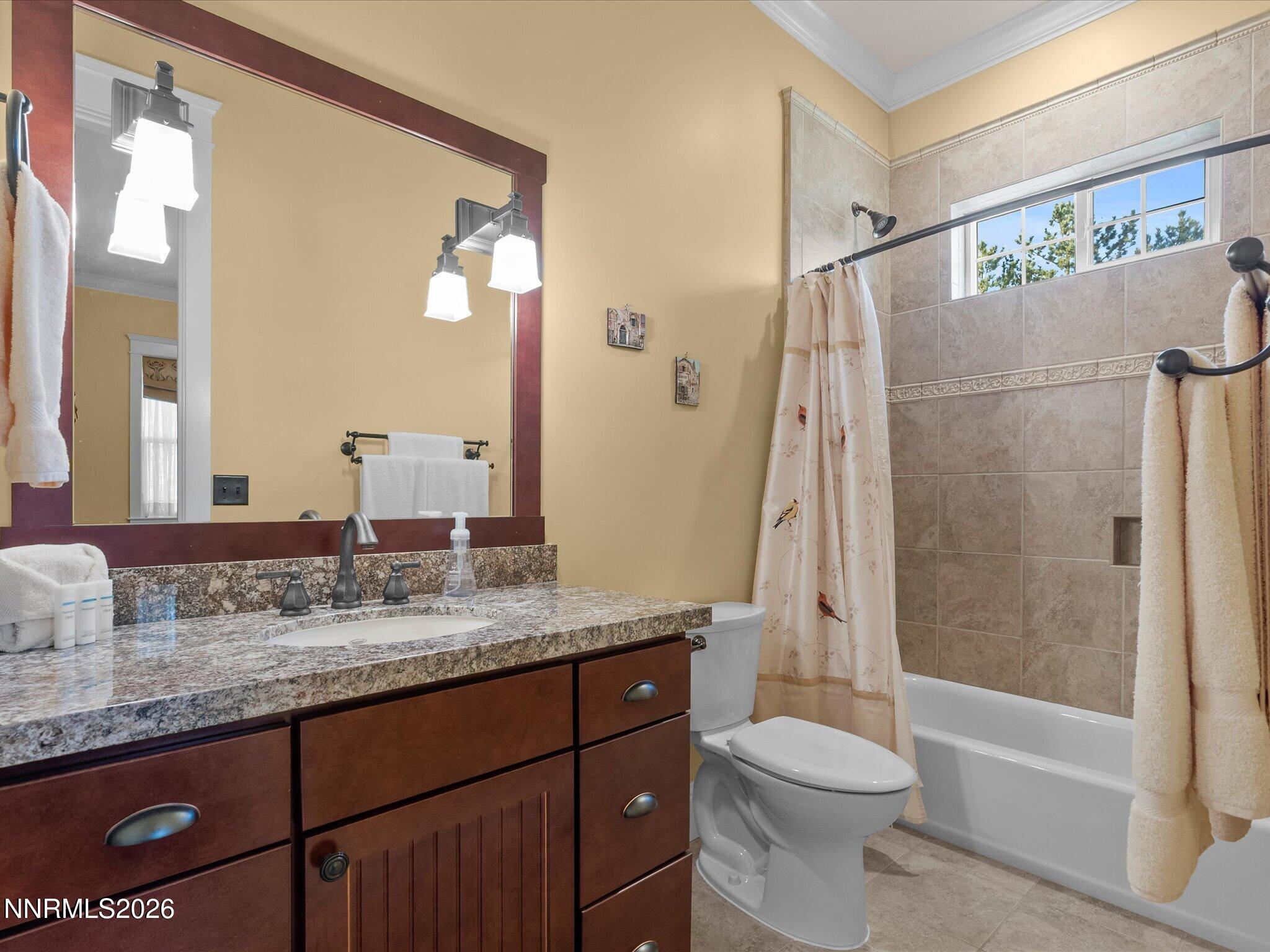 201 South Argyle Court Reno, NV 89511 - Photo 50 of 95 a bathroom with a granite countertop sink toilet and shower