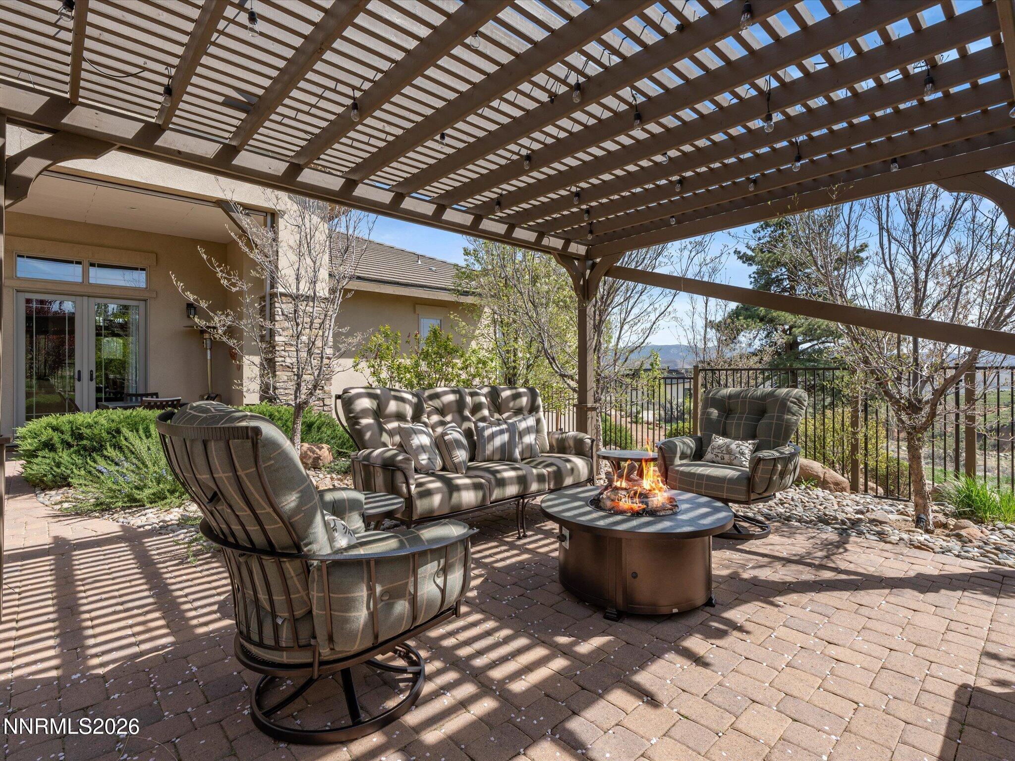 201 South Argyle Court Reno, NV 89511 - Photo 59 of 95 Pergola Fenced Back Yard