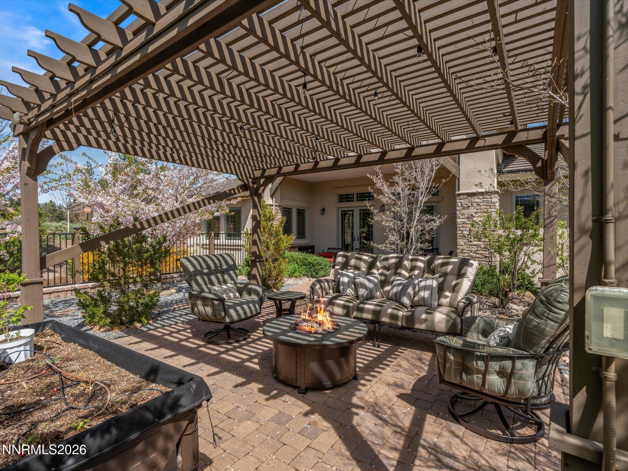 201 South Argyle Court Reno, NV 89511 - Photo 60 of 95 a view of a chairs and table in backyard