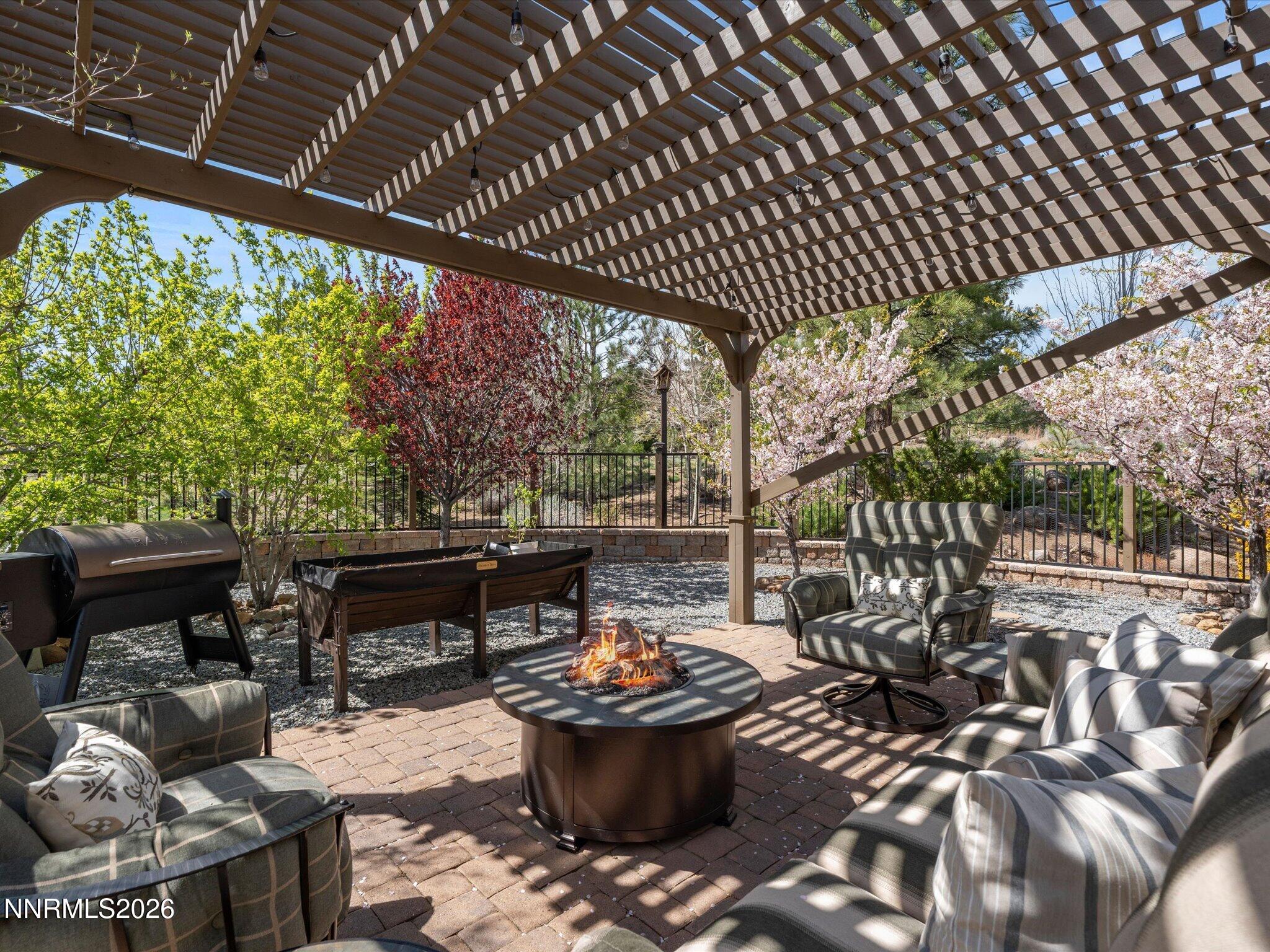 201 South Argyle Court Reno, NV 89511 - Photo 62 of 95 Pergola Fenced Back Yard