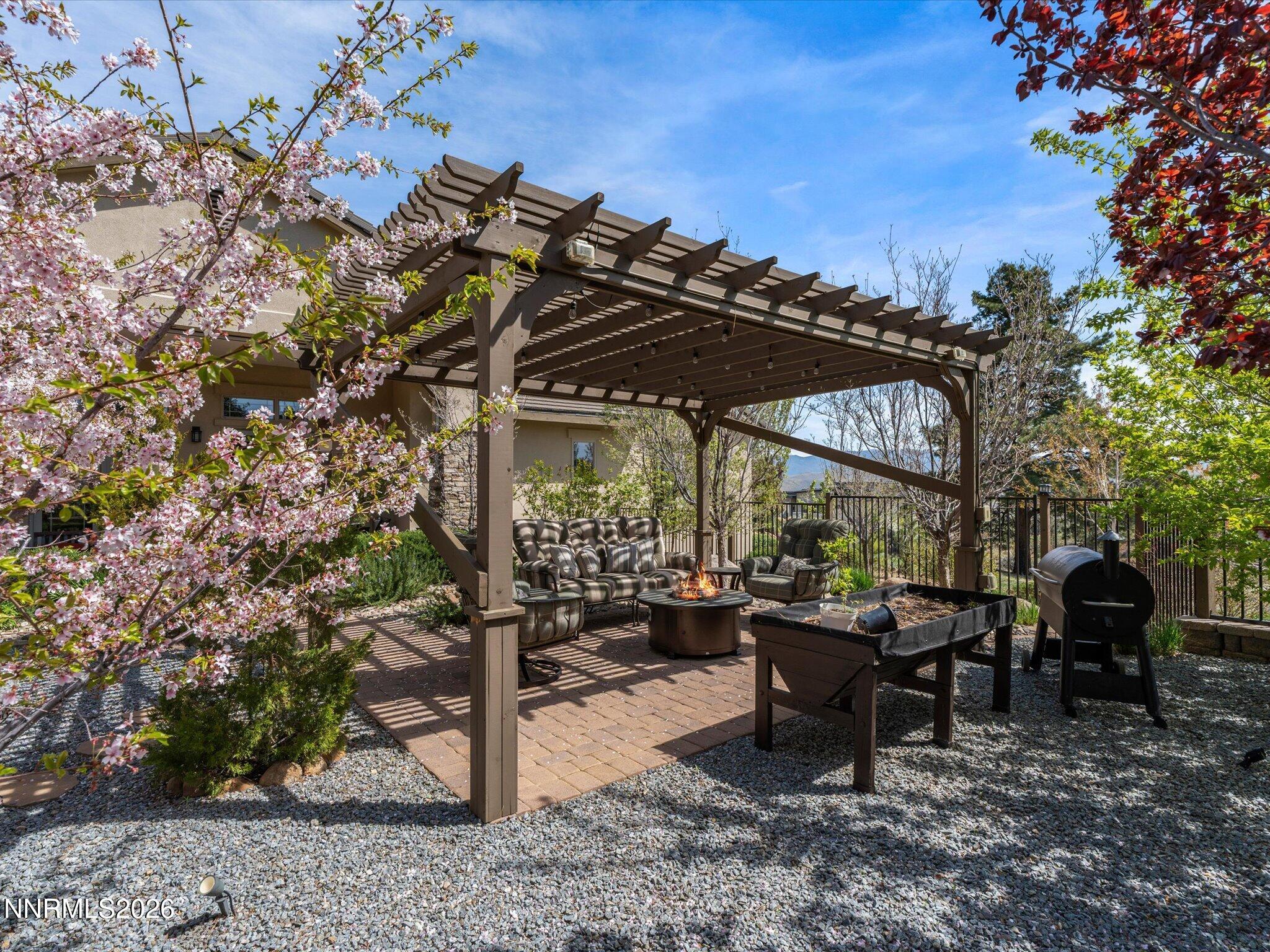 201 South Argyle Court Reno, NV 89511 - Photo 63 of 95 Pergola Fenced Back Yard