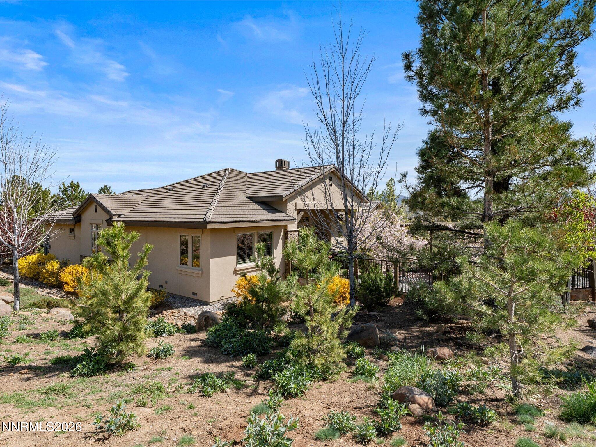 201 South Argyle Court Reno, NV 89511 - Photo 68 of 95 a front view of a house with a yard