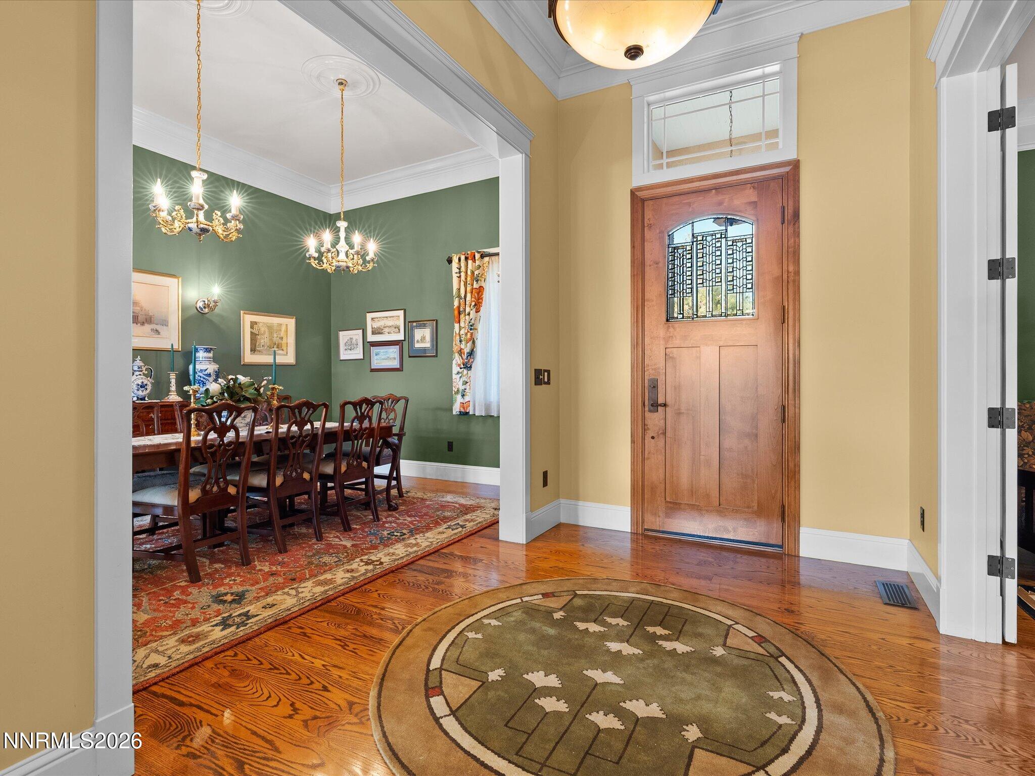 201 South Argyle Court Reno, NV 89511 - Photo 7 of 95 a very nice looking dining room with a rug and wooden floor