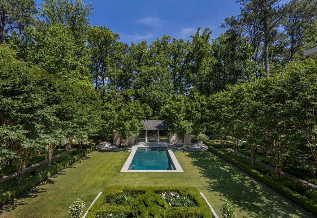 133 Blackland Road Northwest Atlanta, GA 30342 - Photo 23 of 38 a view of a swimming pool with a yard