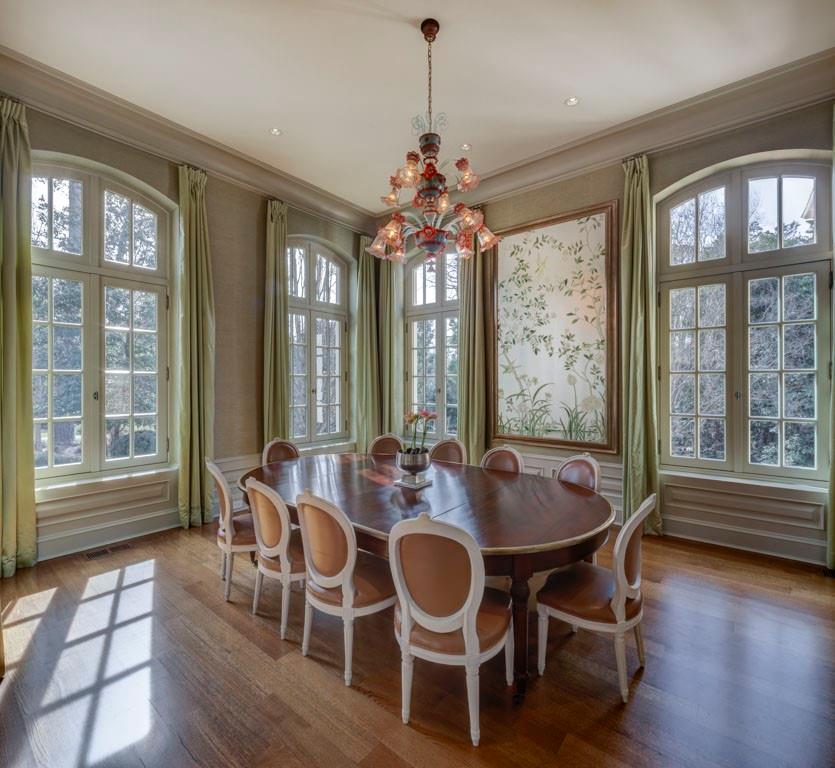 133 Blackland Road Northwest Atlanta, GA 30342 - Photo 8 of 38 a view of a dining room with furniture wooden floor and chandelier