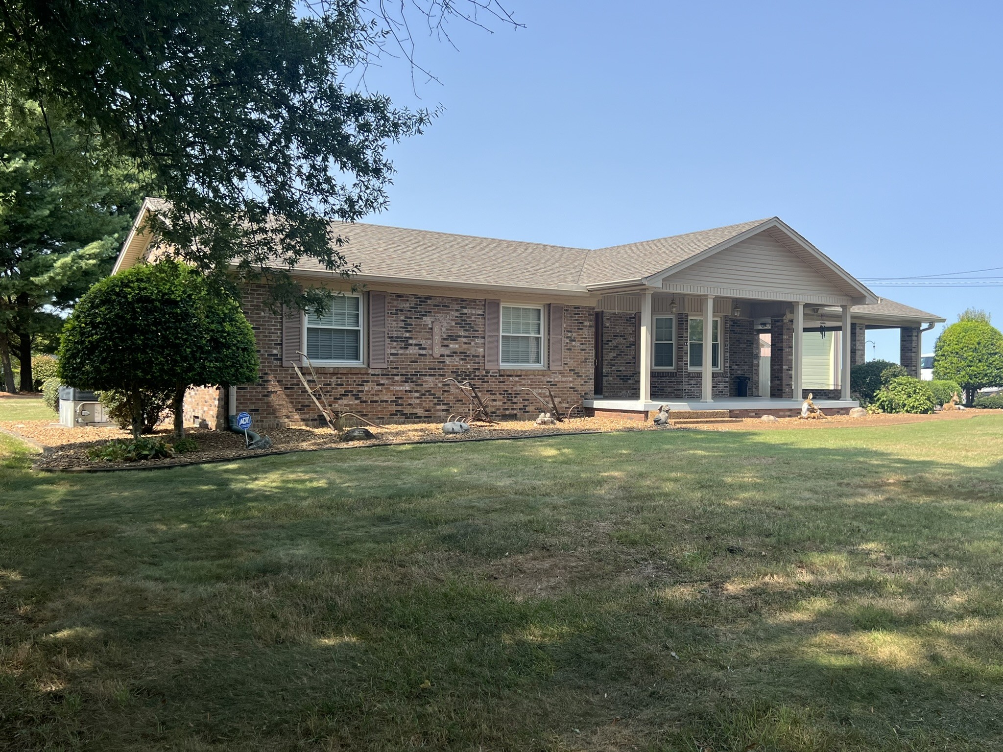 676 Old Gallatin Road Portland, TN 37148 - Photo 1 of 54 a front view of house with yard and green space