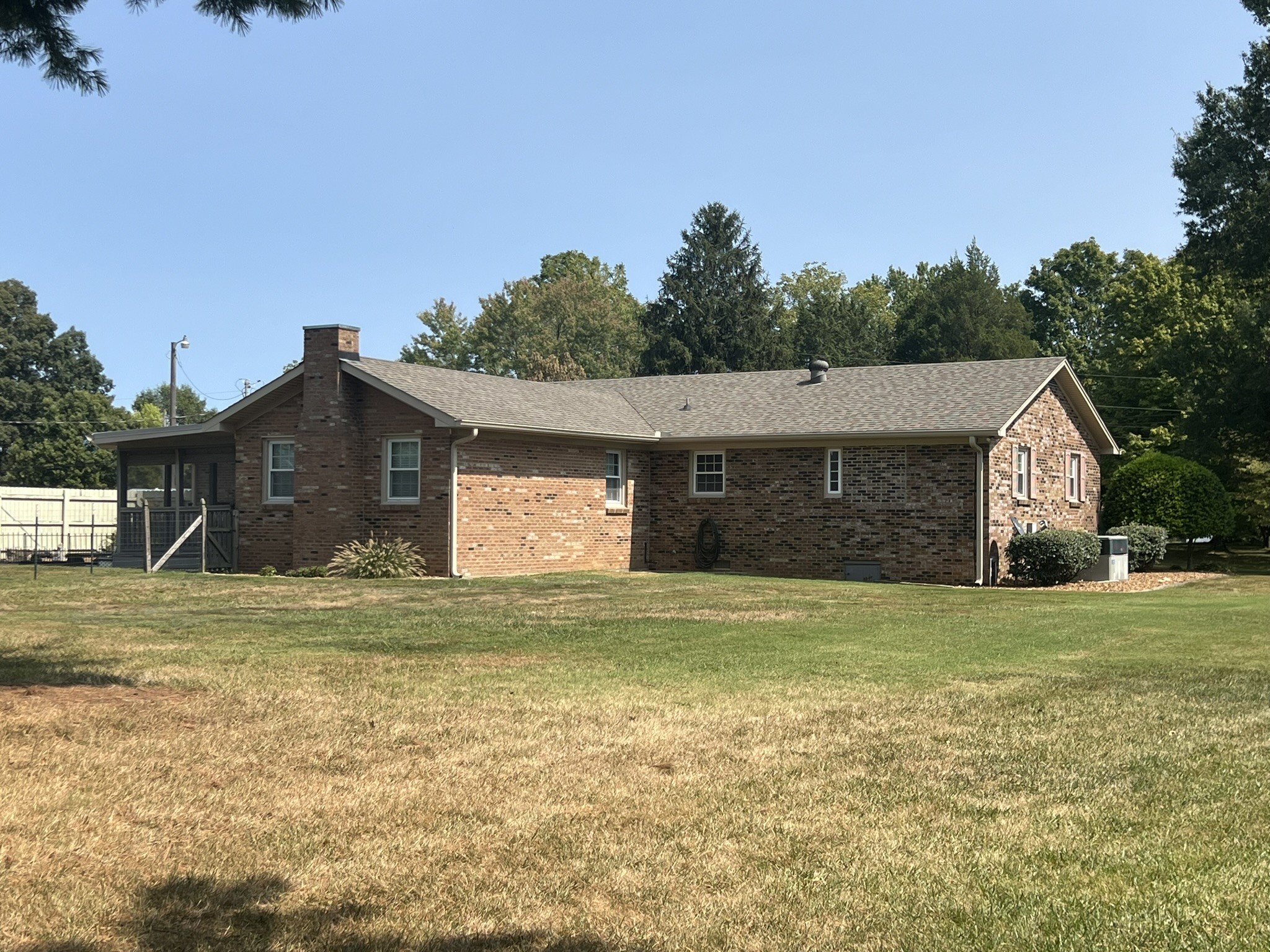 676 Old Gallatin Road Portland, TN 37148 - Photo 13 of 54 a view of a house with a yard and a garage