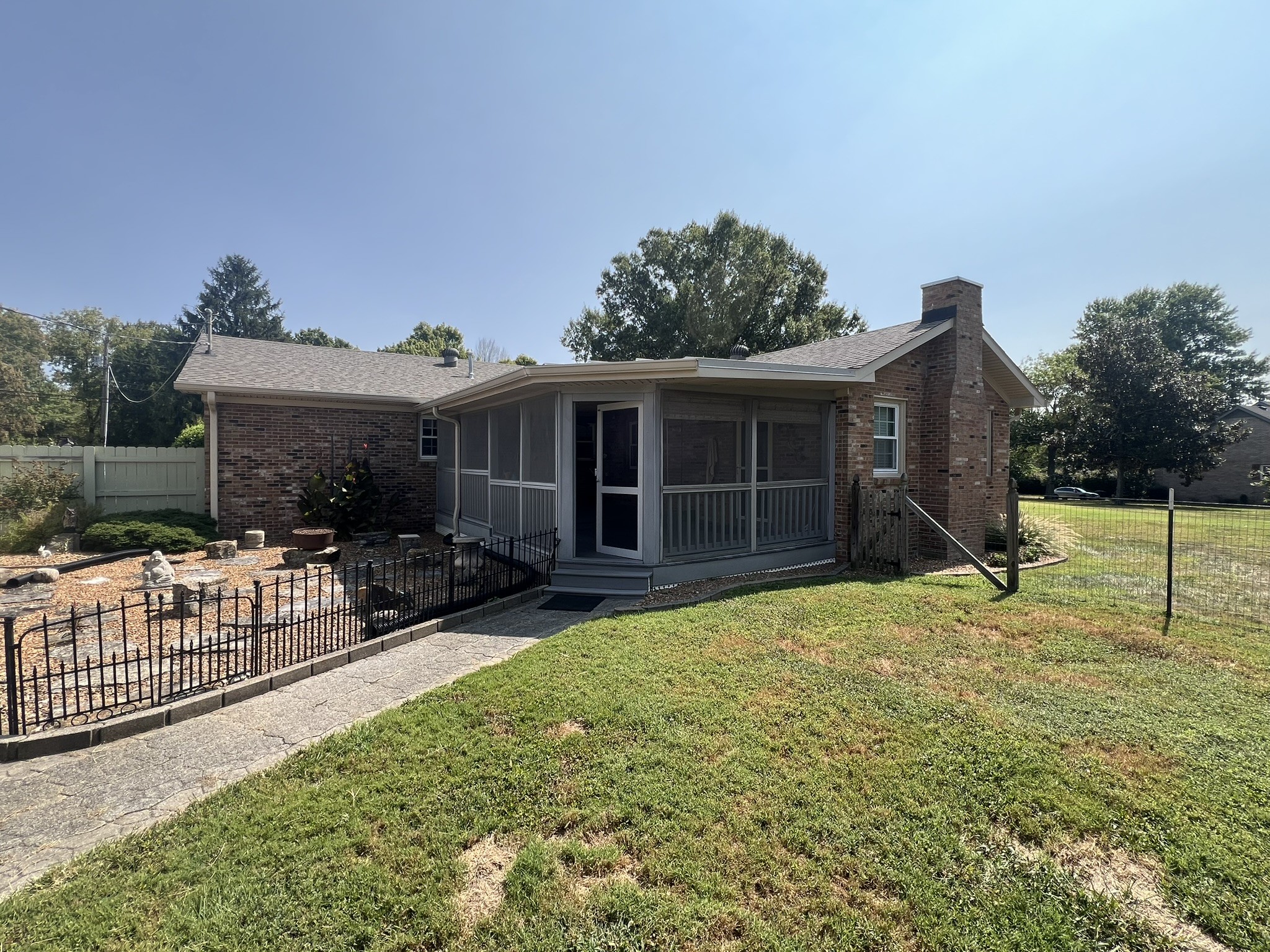 676 Old Gallatin Road Portland, TN 37148 - Photo 30 of 54 a view of a house with a yard and sitting area