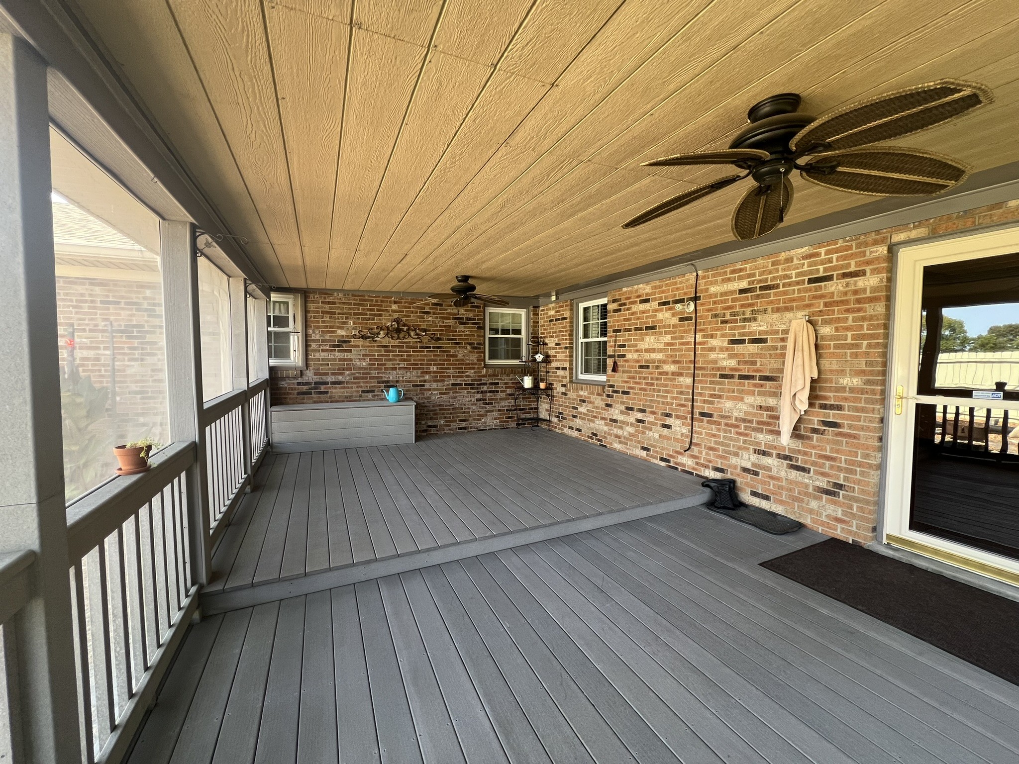 676 Old Gallatin Road Portland, TN 37148 - Photo 35 of 54 a view of a porch with wooden floor and iron stairs