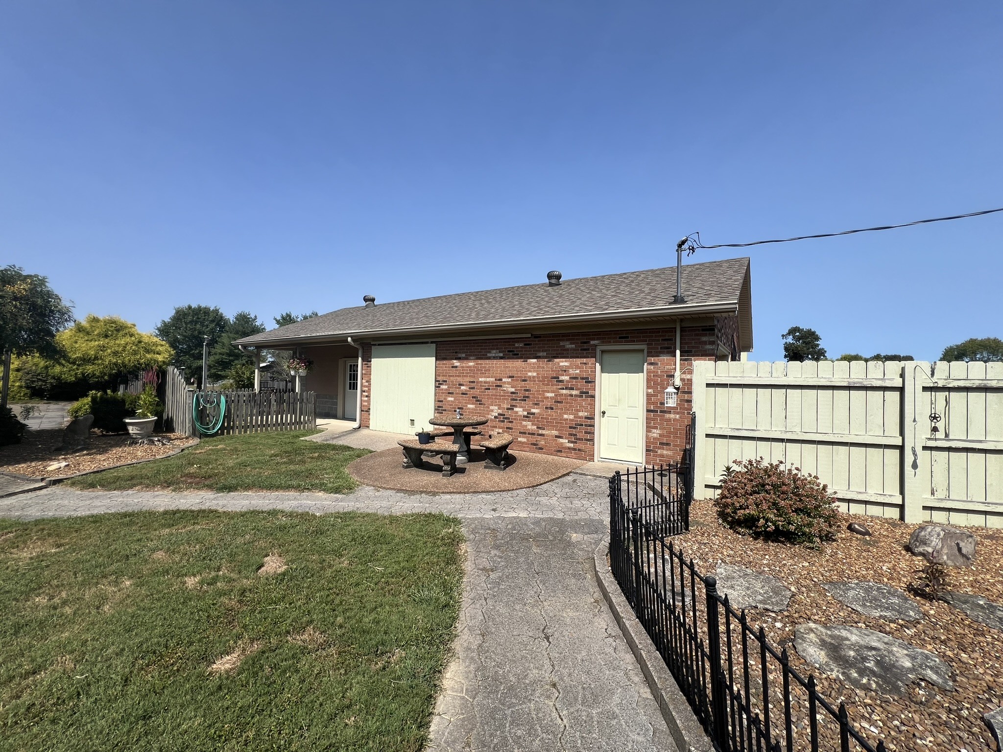 676 Old Gallatin Road Portland, TN 37148 - Photo 38 of 54 a view of a house with backyard and sitting area