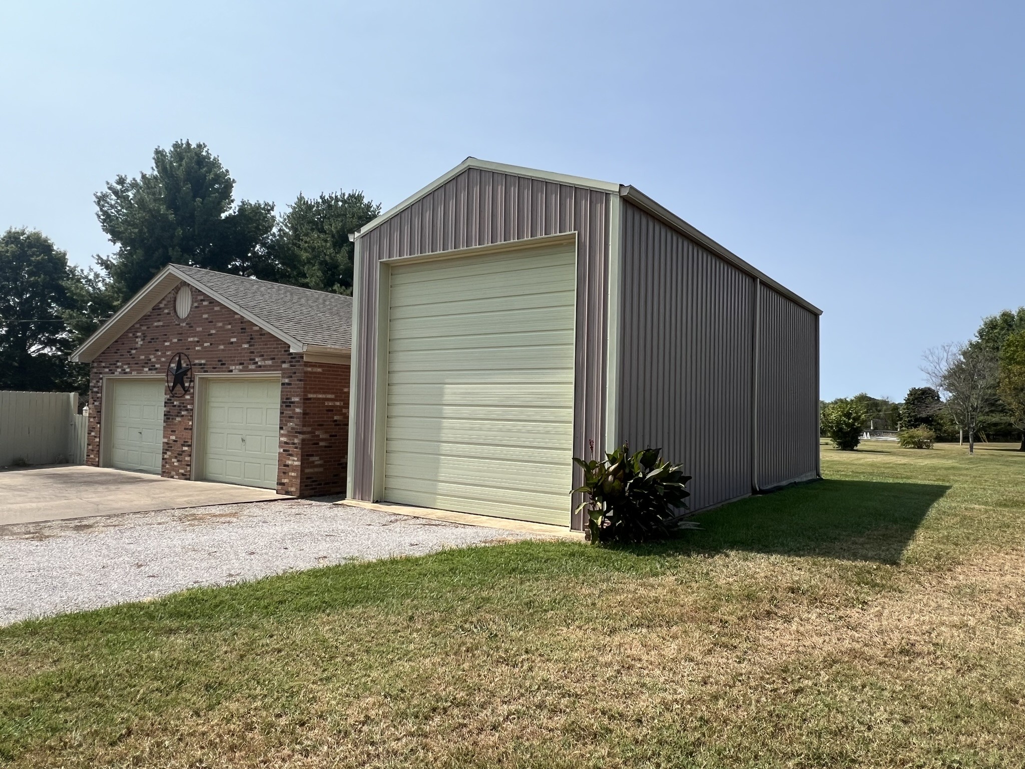 676 Old Gallatin Road Portland, TN 37148 - Photo 4 of 54 a front view of a house with a yard
