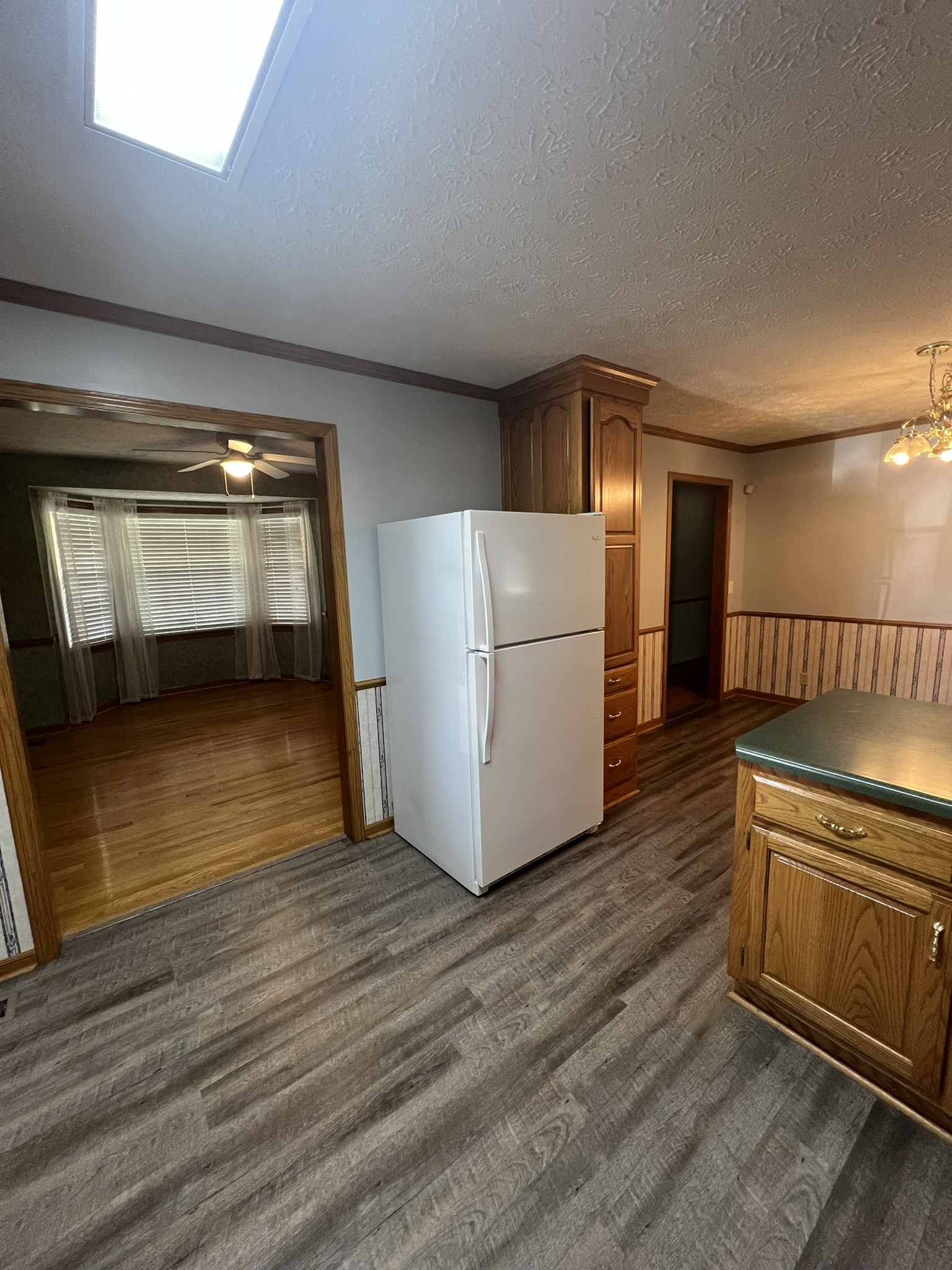 676 Old Gallatin Road Portland, TN 37148 - Photo 42 of 54 a kitchen with granite countertop a stove and a refrigerator