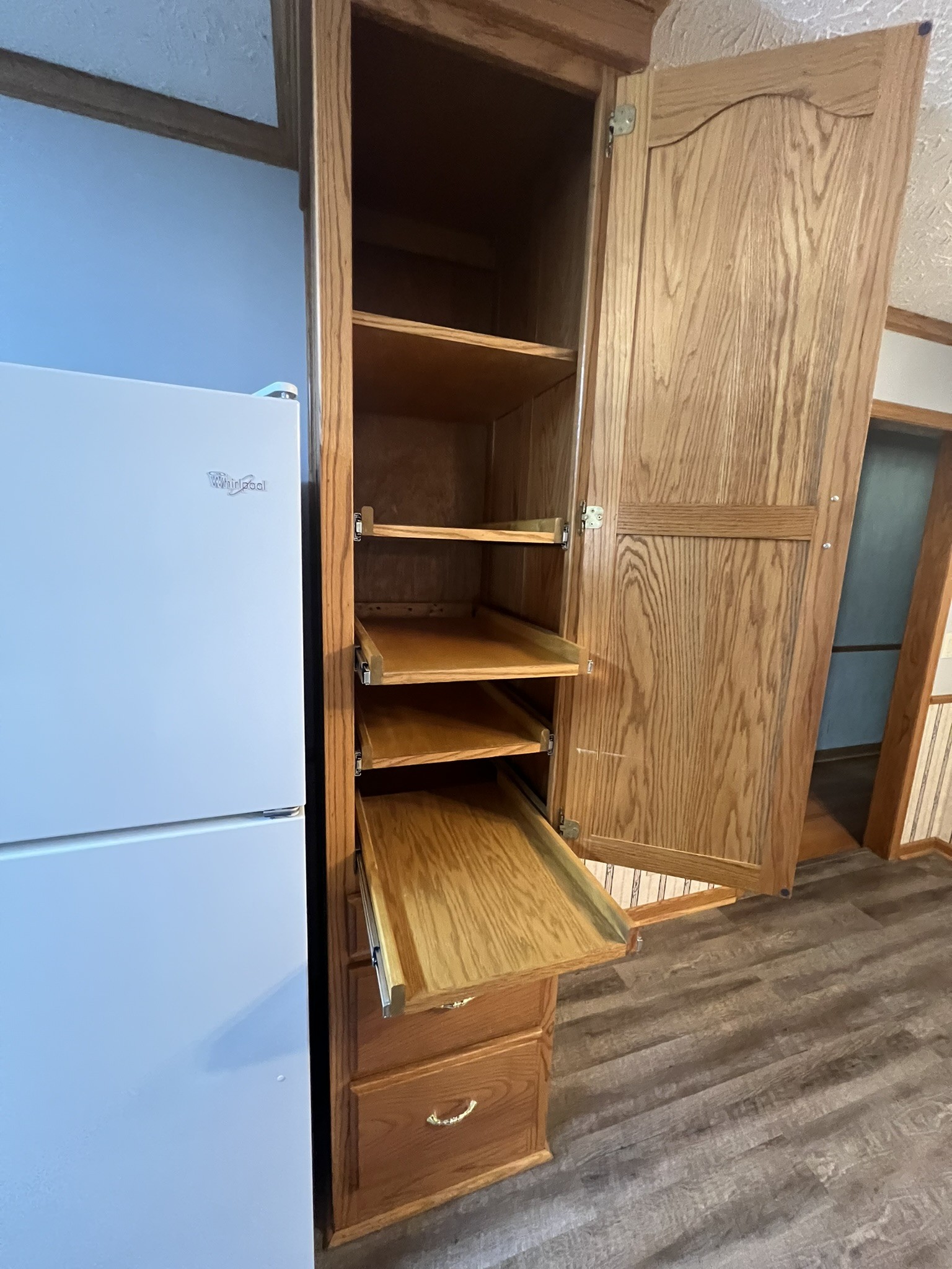 676 Old Gallatin Road Portland, TN 37148 - Photo 43 of 54 a view of walk in closet with empty racks