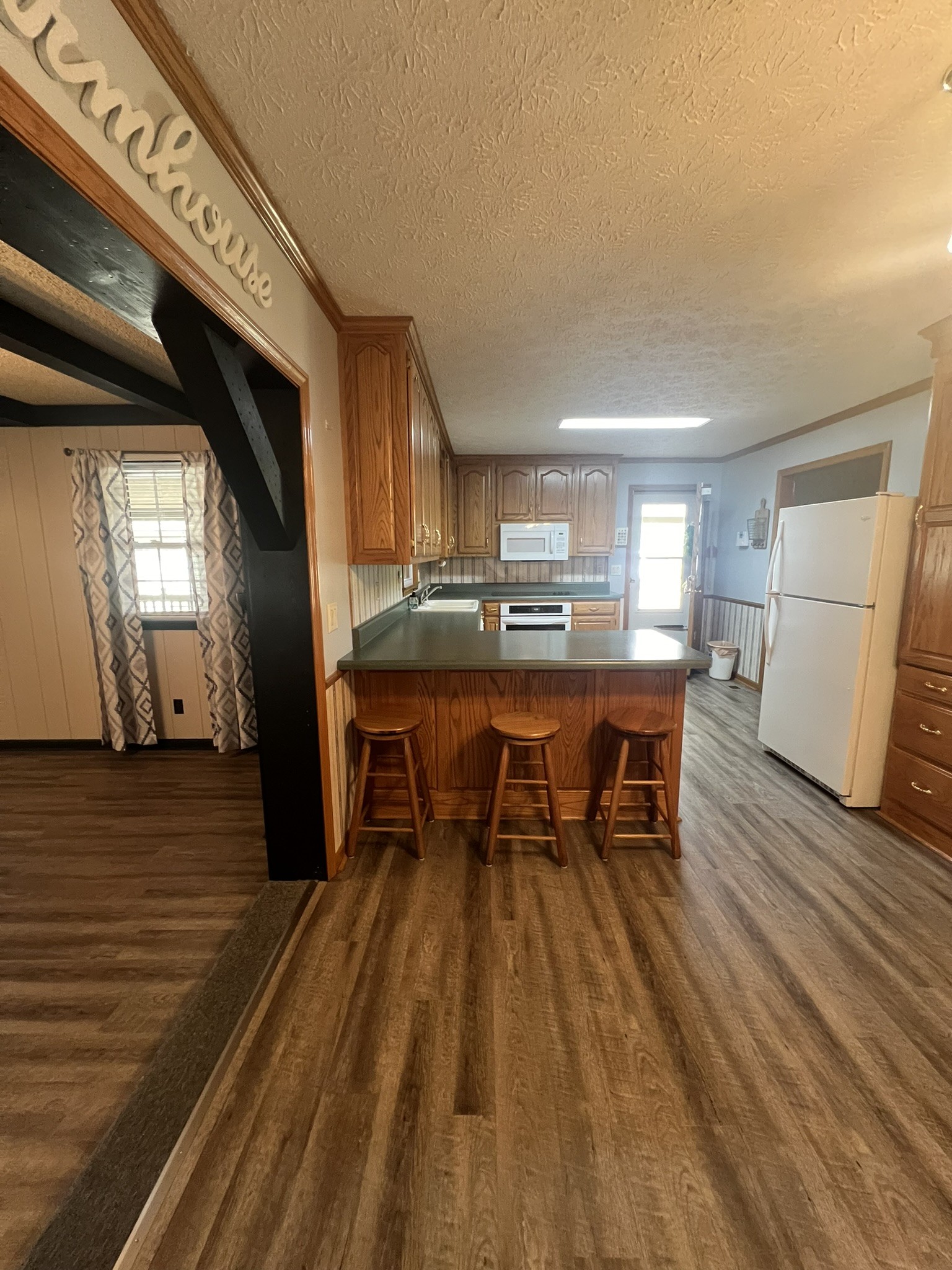 676 Old Gallatin Road Portland, TN 37148 - Photo 47 of 54 a dining room with furniture and wooden floor