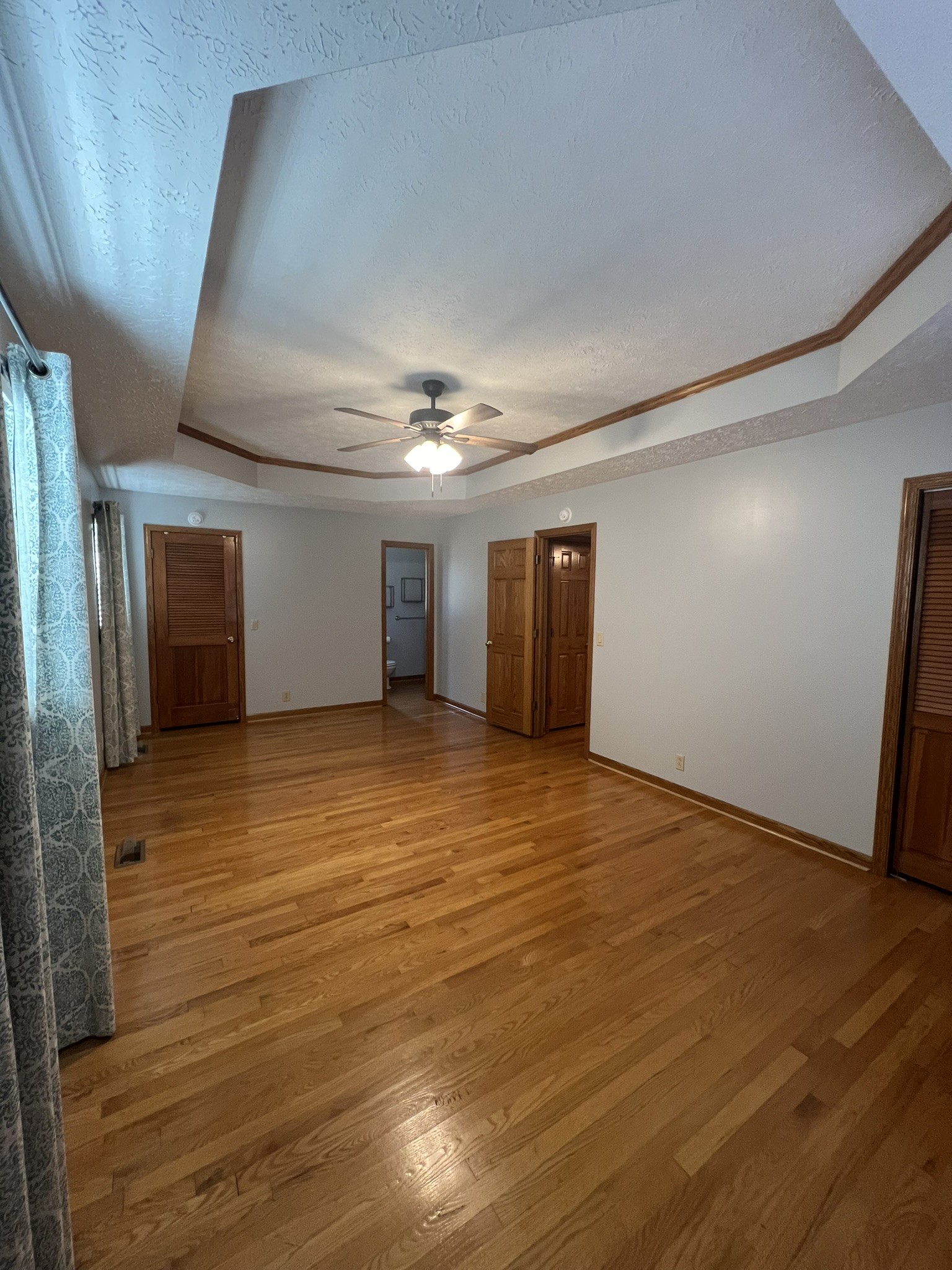 676 Old Gallatin Road Portland, TN 37148 - Photo 48 of 54 a view of an empty room with wooden floor