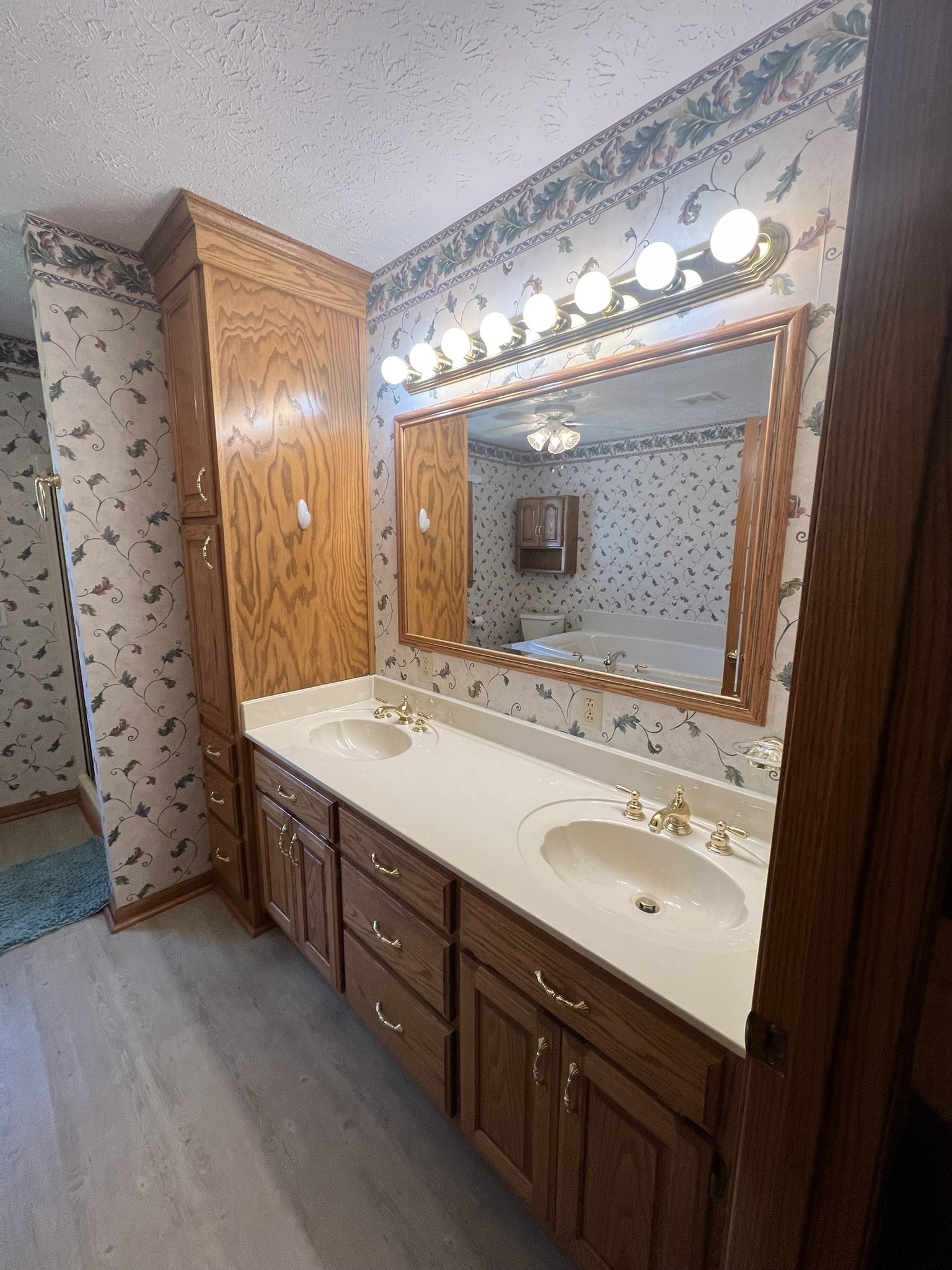 676 Old Gallatin Road Portland, TN 37148 - Photo 51 of 54 a bathroom with a double vanity sink mirror and shower