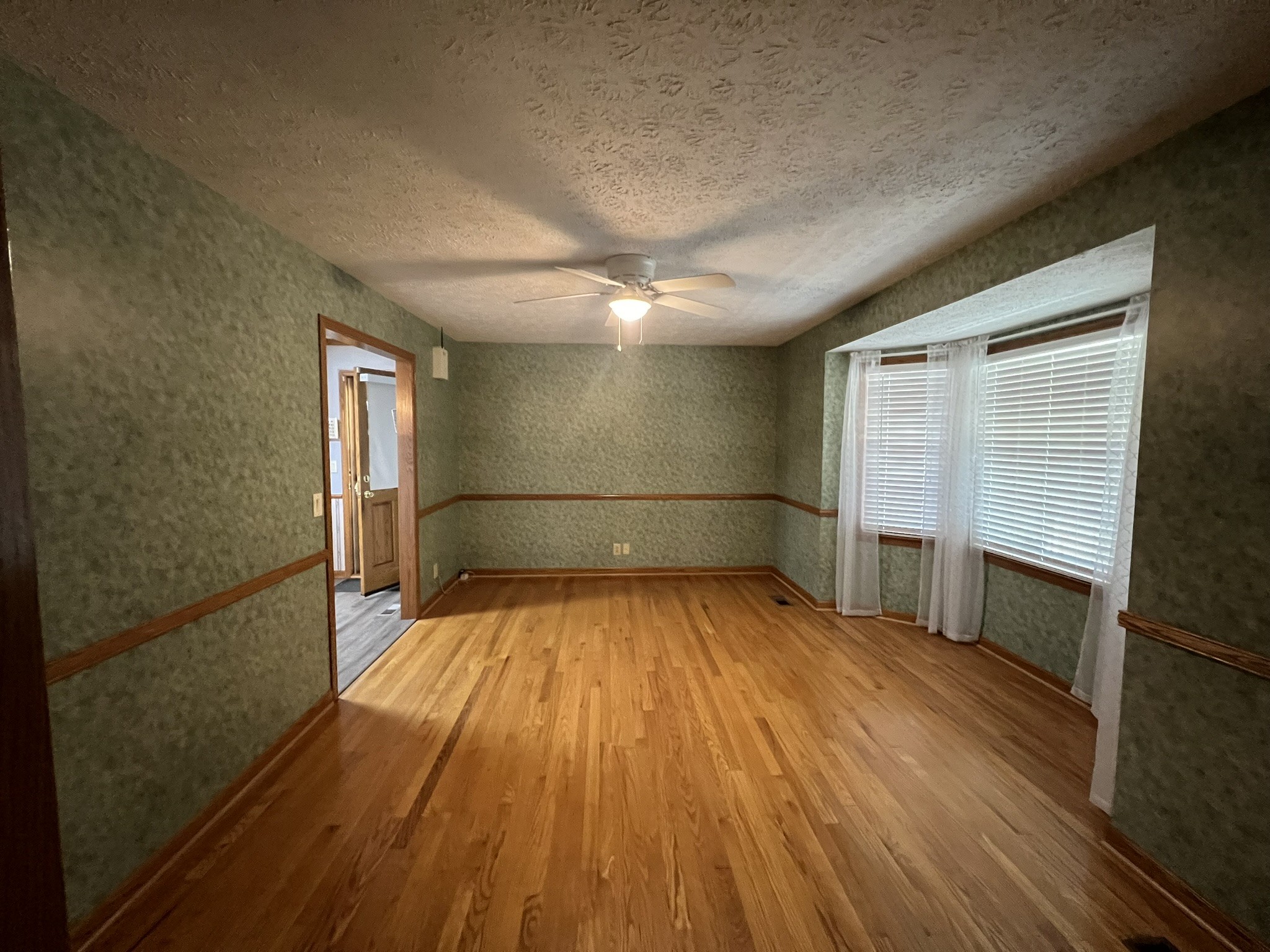 676 Old Gallatin Road Portland, TN 37148 - Photo 54 of 54 a view of a room with wooden floor and staircase