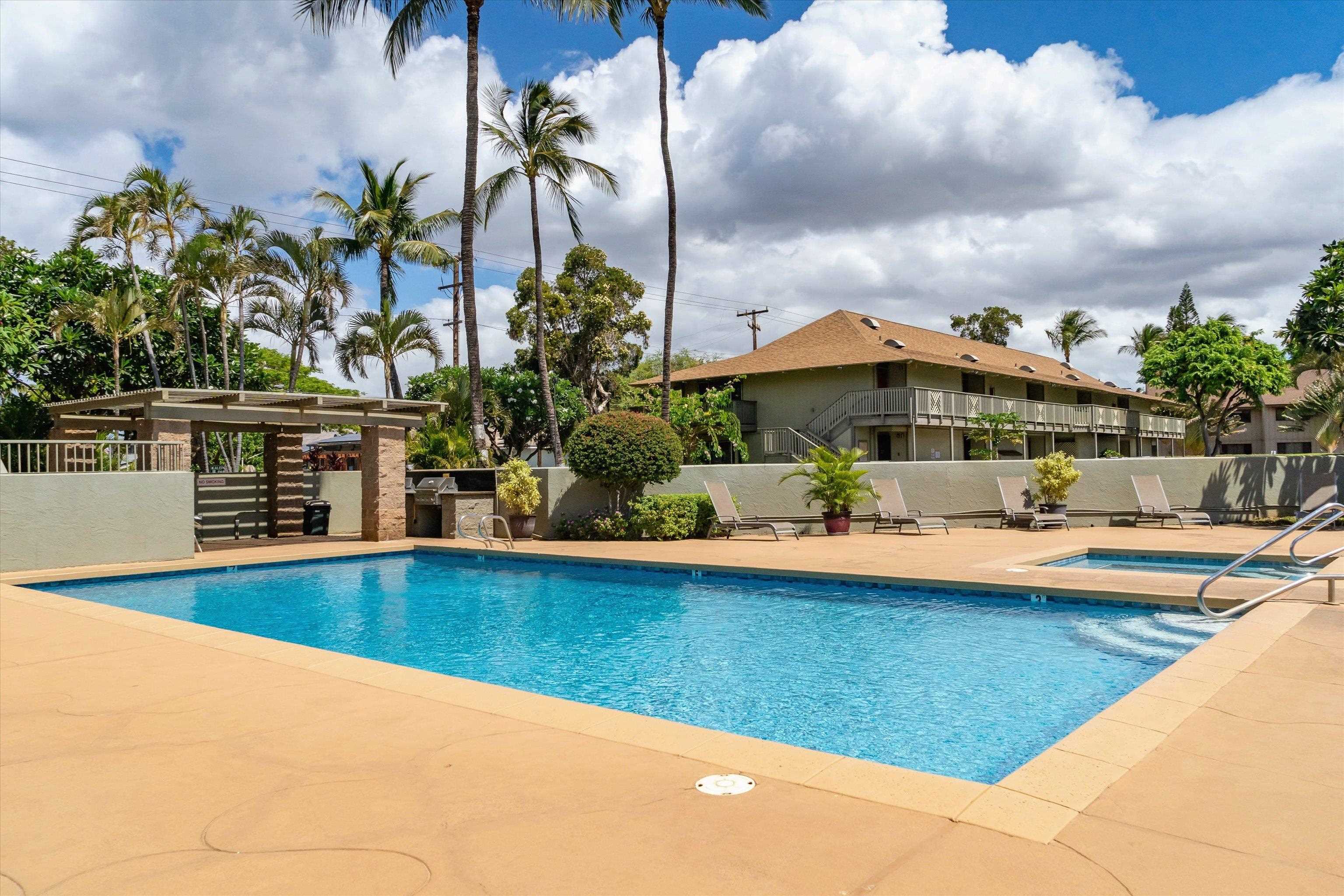715 South Kihei Road, Unit B 120 Kihei, HI 96753 - Photo 23 of 36 a view of a swimming pool and lounge chair