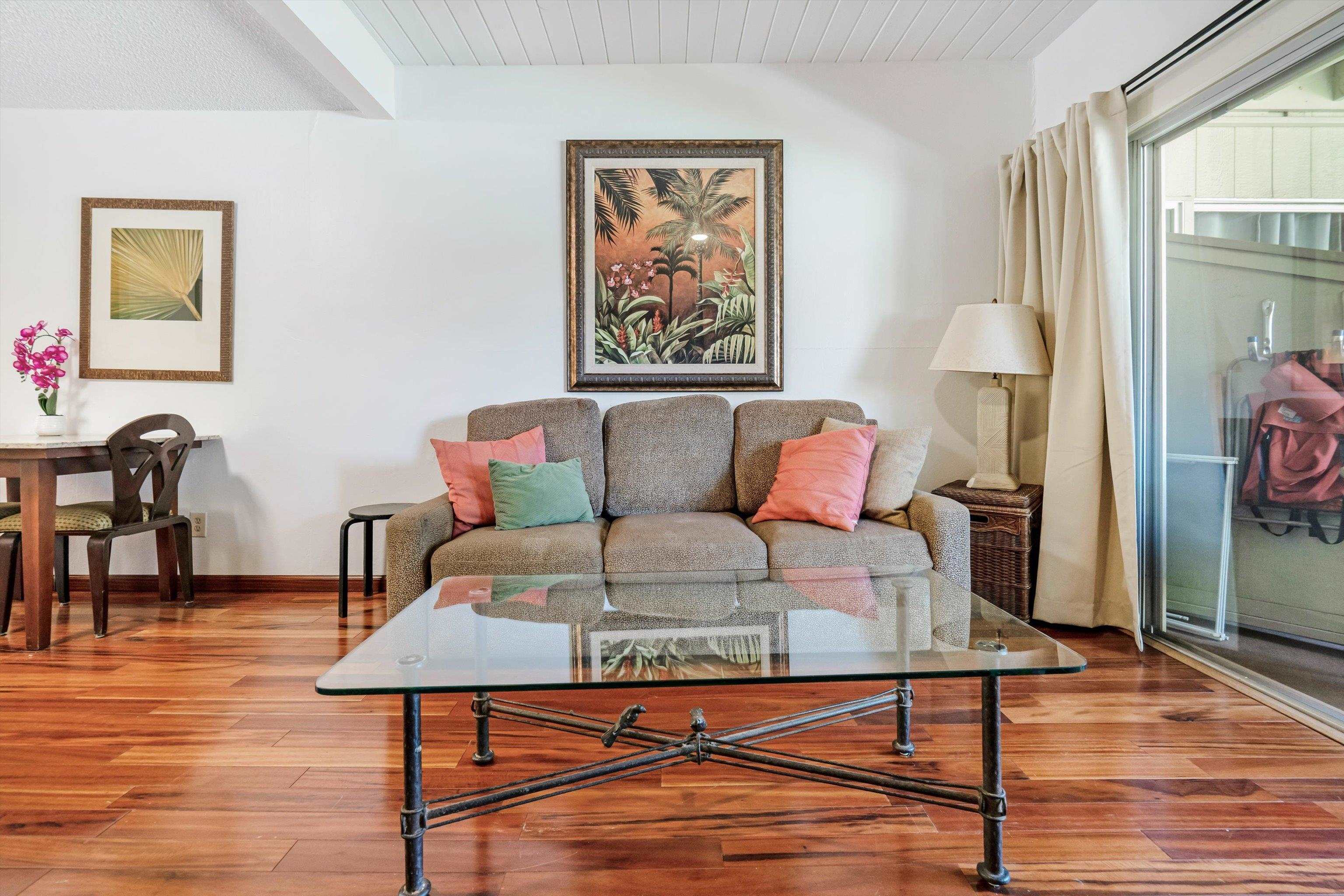 715 South Kihei Road, Unit B 120 Kihei, HI 96753 - Photo 10 of 36 a living room with furniture and wooden floor